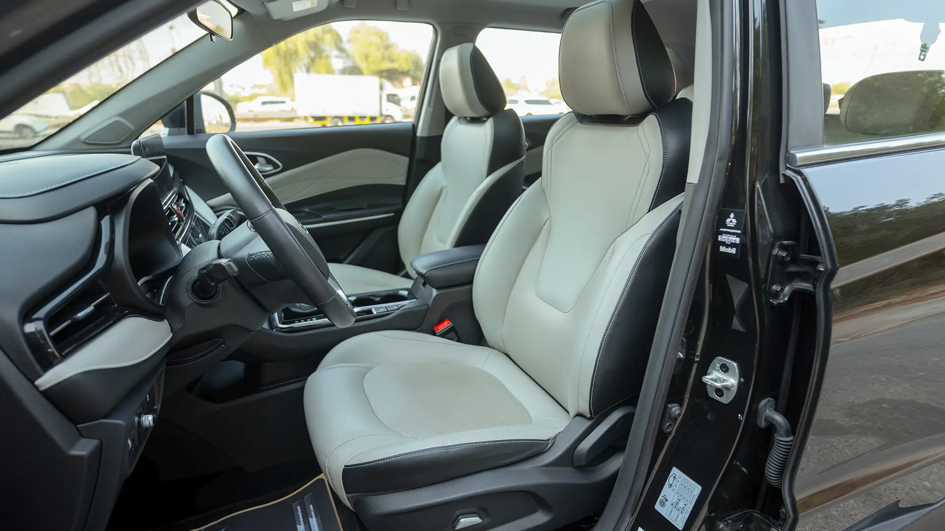 Used 2023 JAC JS4 Intelligent in Black – Front Driver Side Cabin View for Sale at First Choice Cars Dubai Sharjah