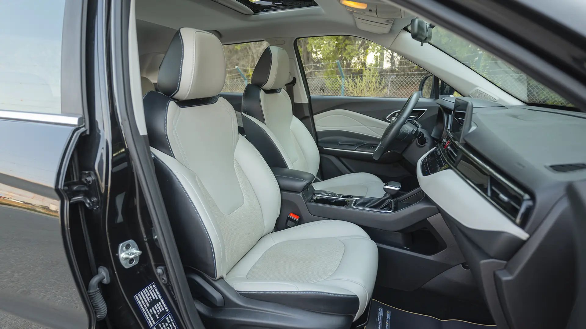 Used 2023 JAC JS4 Intelligent in Black – Front Passenger Side Cabin View for Sale at First Choice Cars Dubai Sharjah