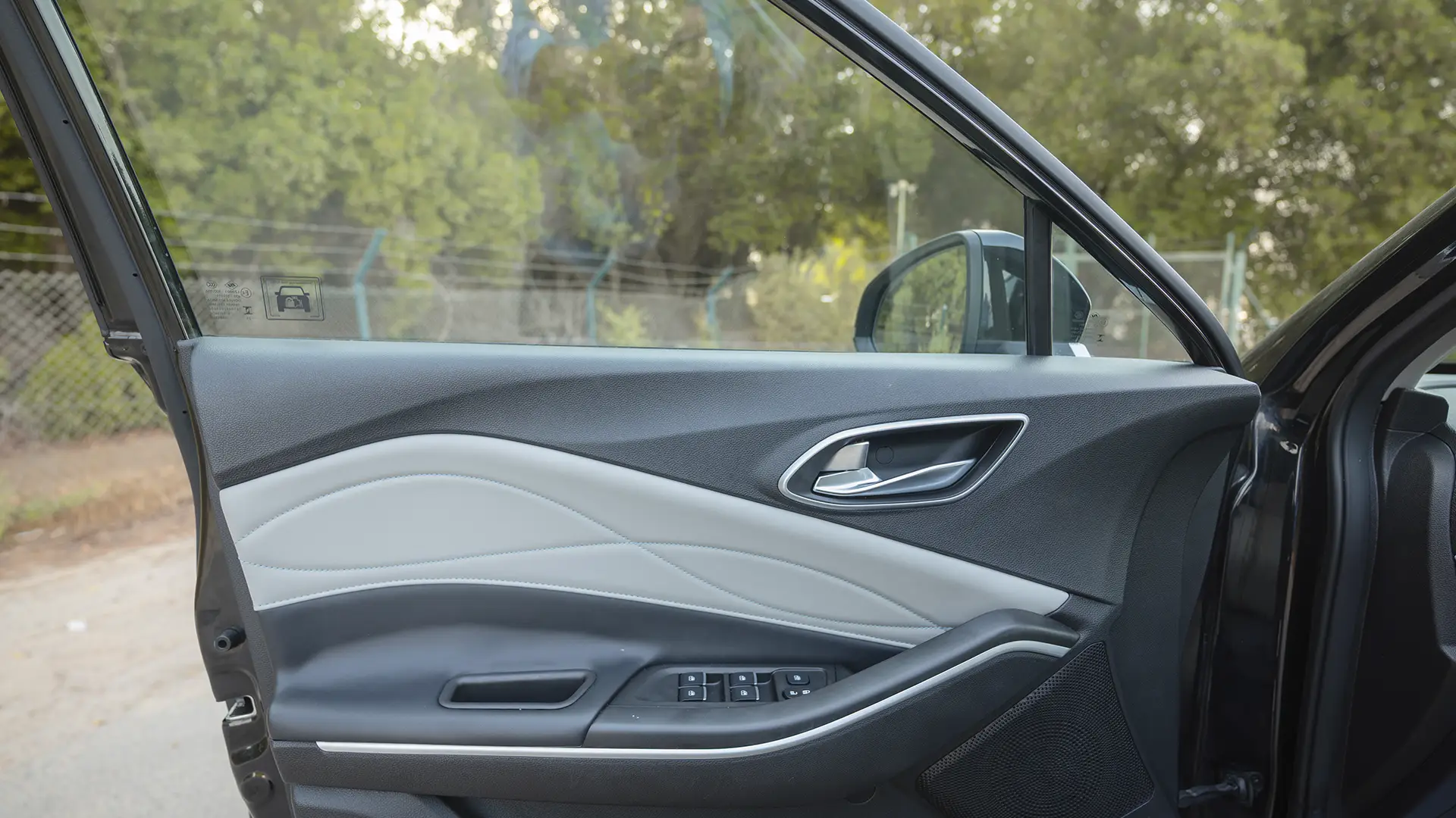 Used 2023 JAC JS4 Intelligent in Black – Driver Door Panel Full View for Sale at First Choice Cars Dubai Sharjah
