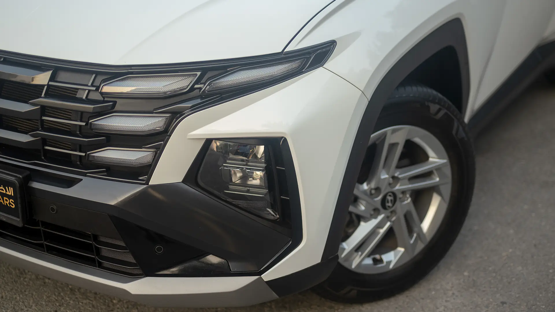 Used 2025 Hyundai Tucson Smart in White – Headlight Close-up for Sale at First Choice Cars Dubai Sharjah