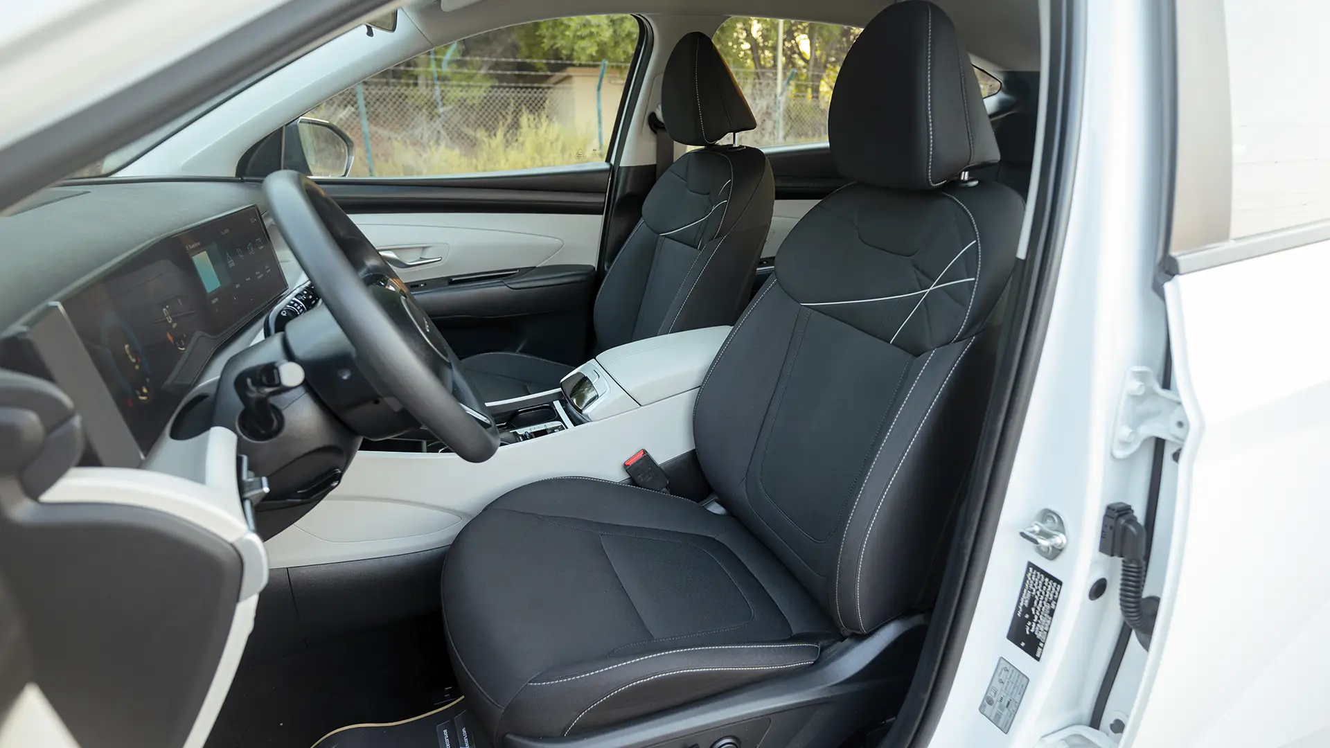 Used 2025 Hyundai Tucson Smart in White – Front Driver Side Cabin View for Sale at First Choice Cars Dubai Sharjah