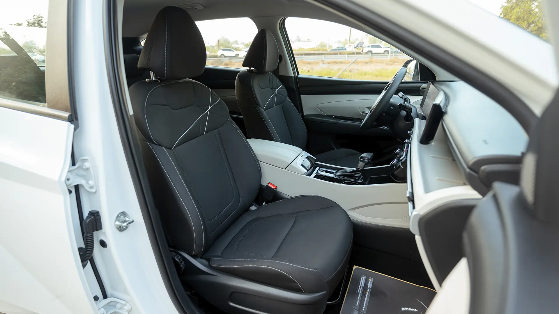 Used 2025 Hyundai Tucson Smart in White – Front Passenger Side Cabin View for Sale at First Choice Cars Dubai Sharjah