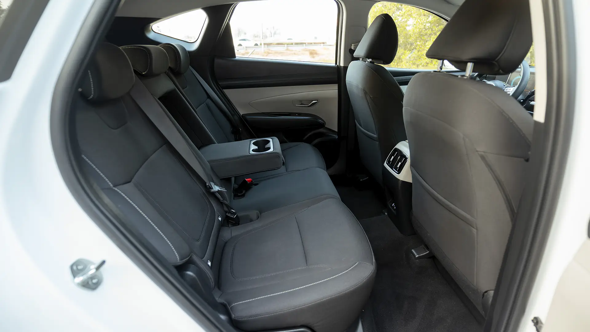 Used 2025 Hyundai Tucson Smart in White – Rear Passenger Side Cabin View for Sale at First Choice Cars Dubai Sharjah