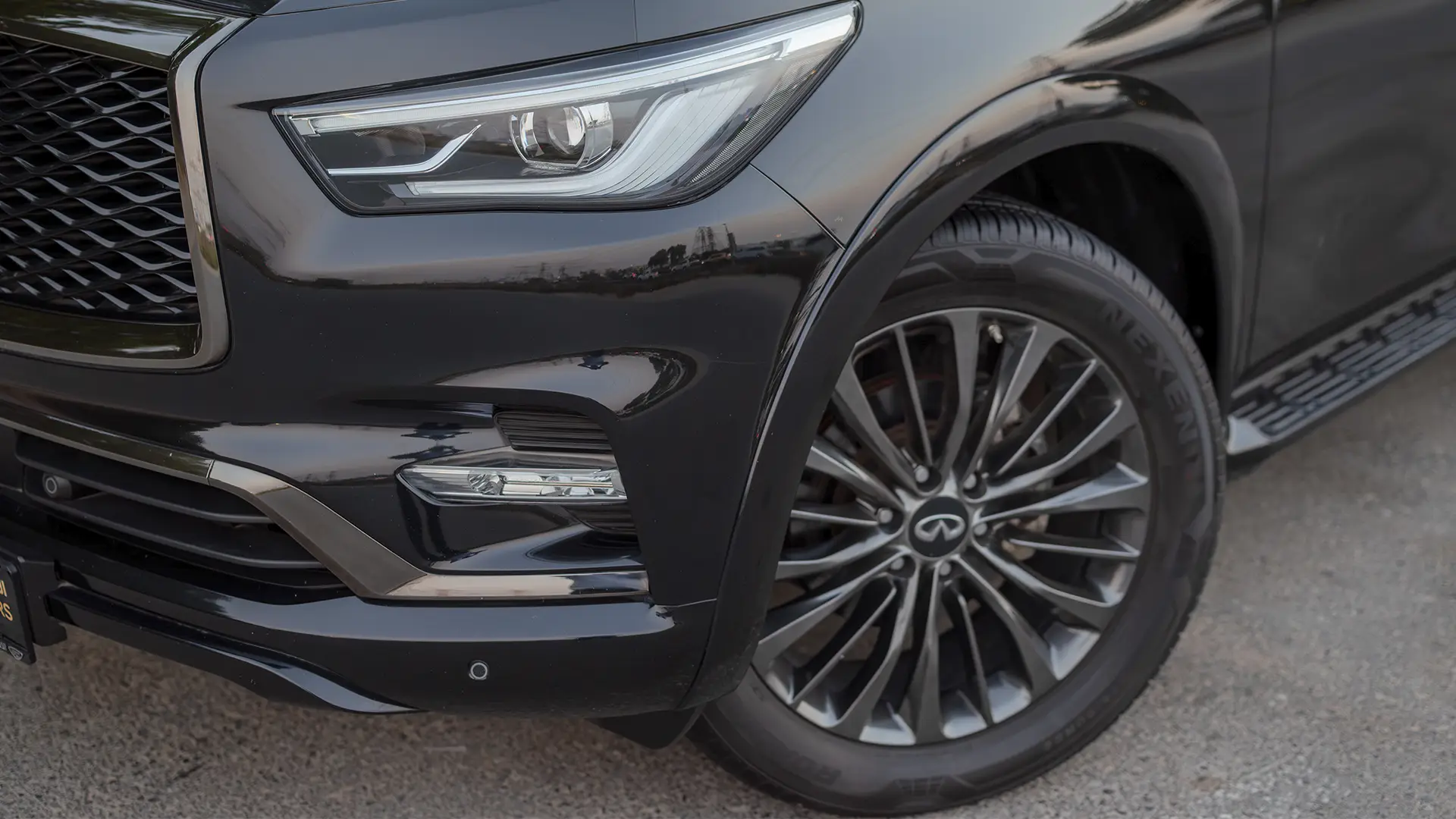 Used 2021 Infiniti QX80 Sensory in Black – Headlight Close-up for Sale at First Choice Cars Dubai Sharjah