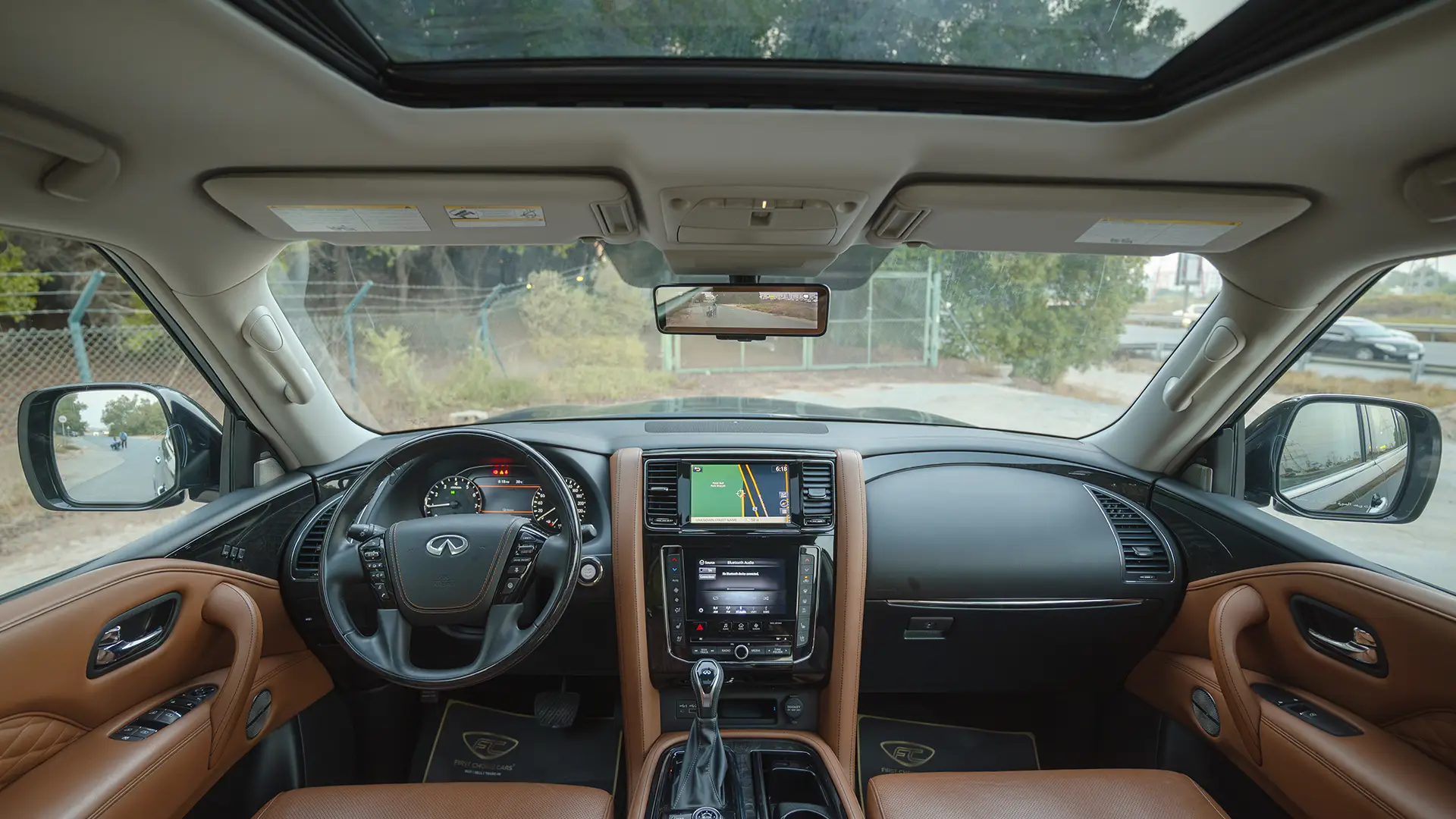 Used 2021 Infiniti QX80 Sensory in Black – Front Cabin / Dashboard Full View for Sale at First Choice Cars Dubai Sharjah