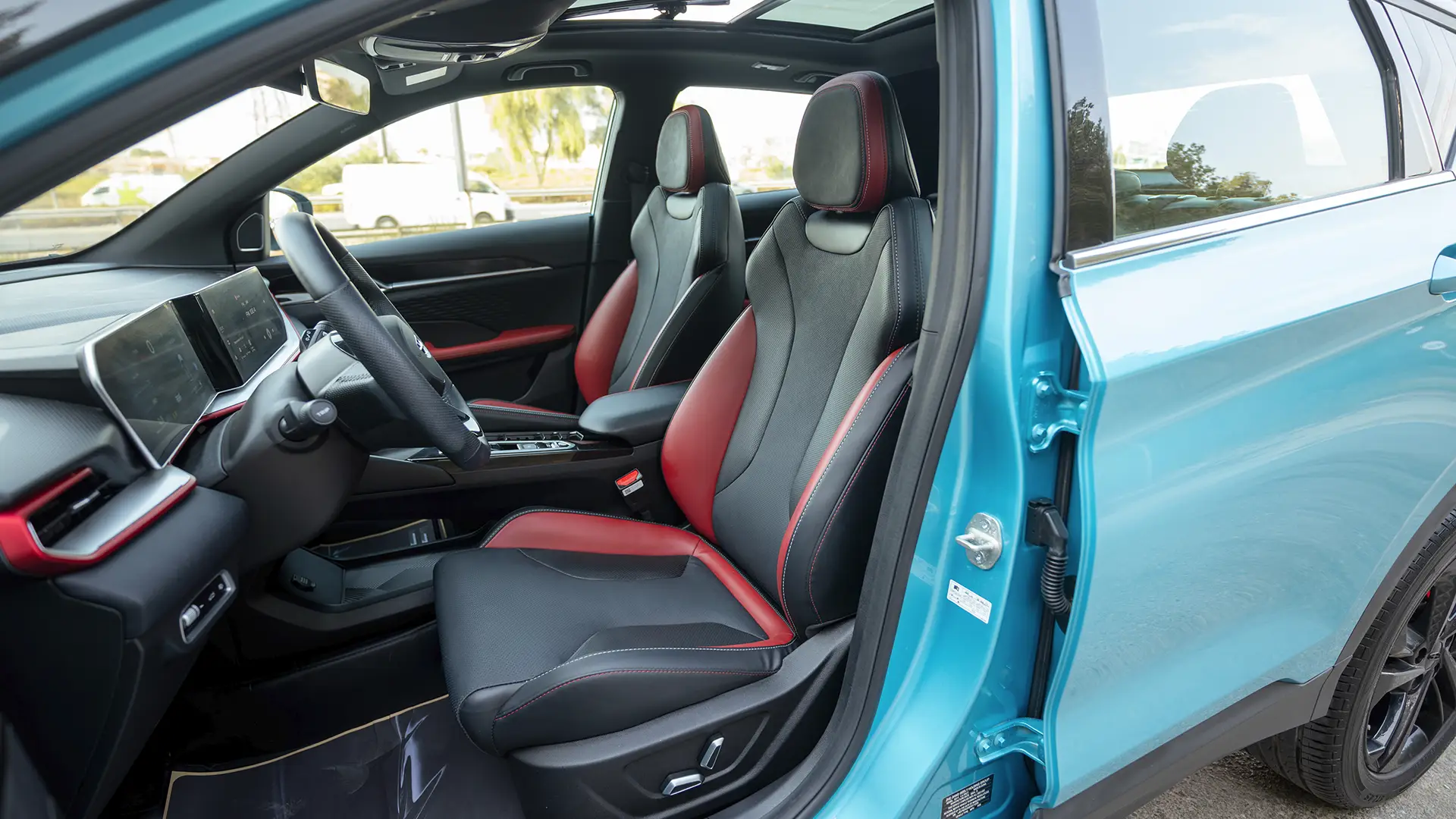 Used 2025 Geely Coolray GF in Blue – Front Driver Side Cabin View for Sale at First Choice Cars Dubai Sharjah