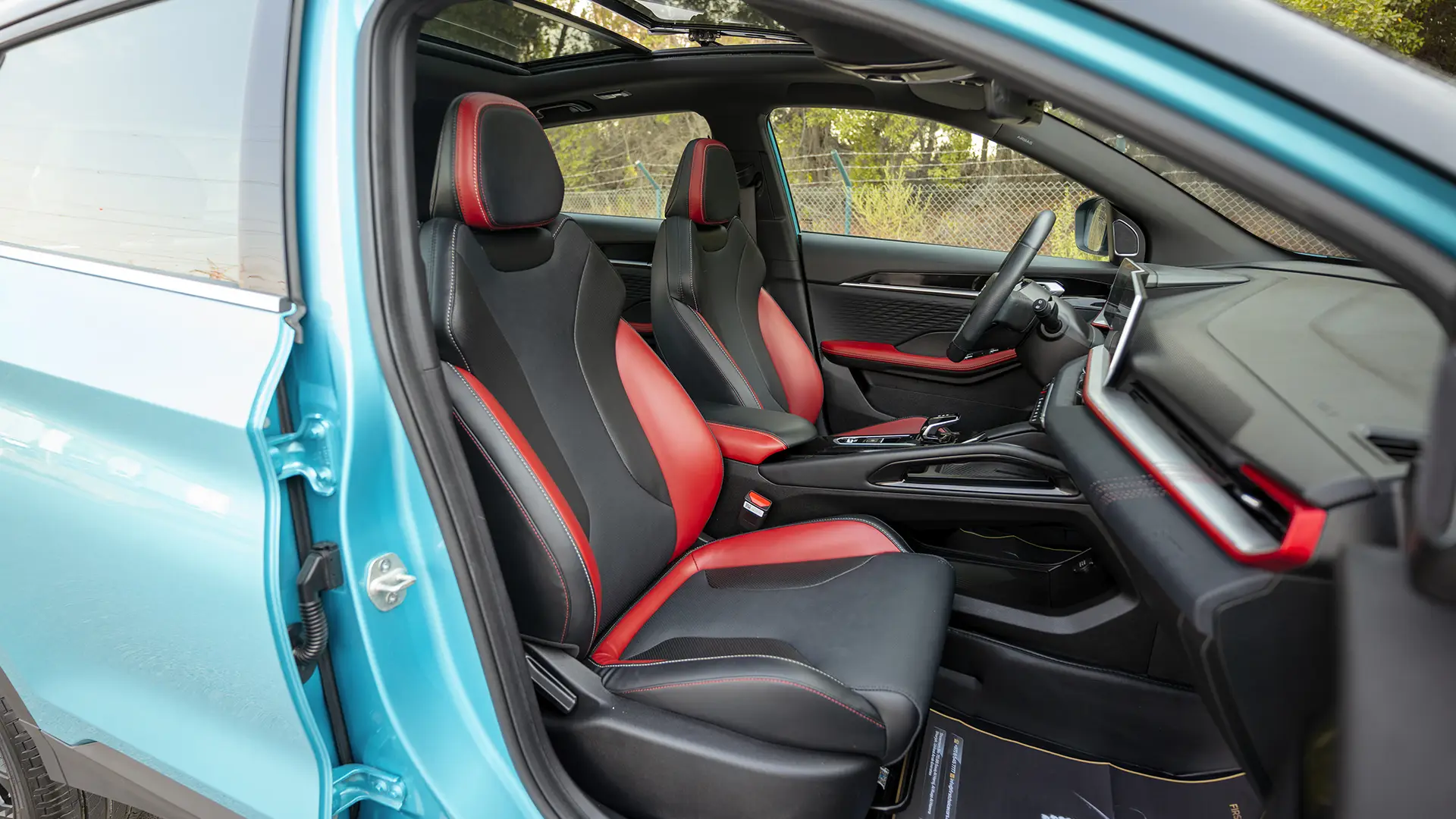 Used 2025 Geely Coolray GF in Blue – Front Passenger Side Cabin View for Sale at First Choice Cars Dubai Sharjah