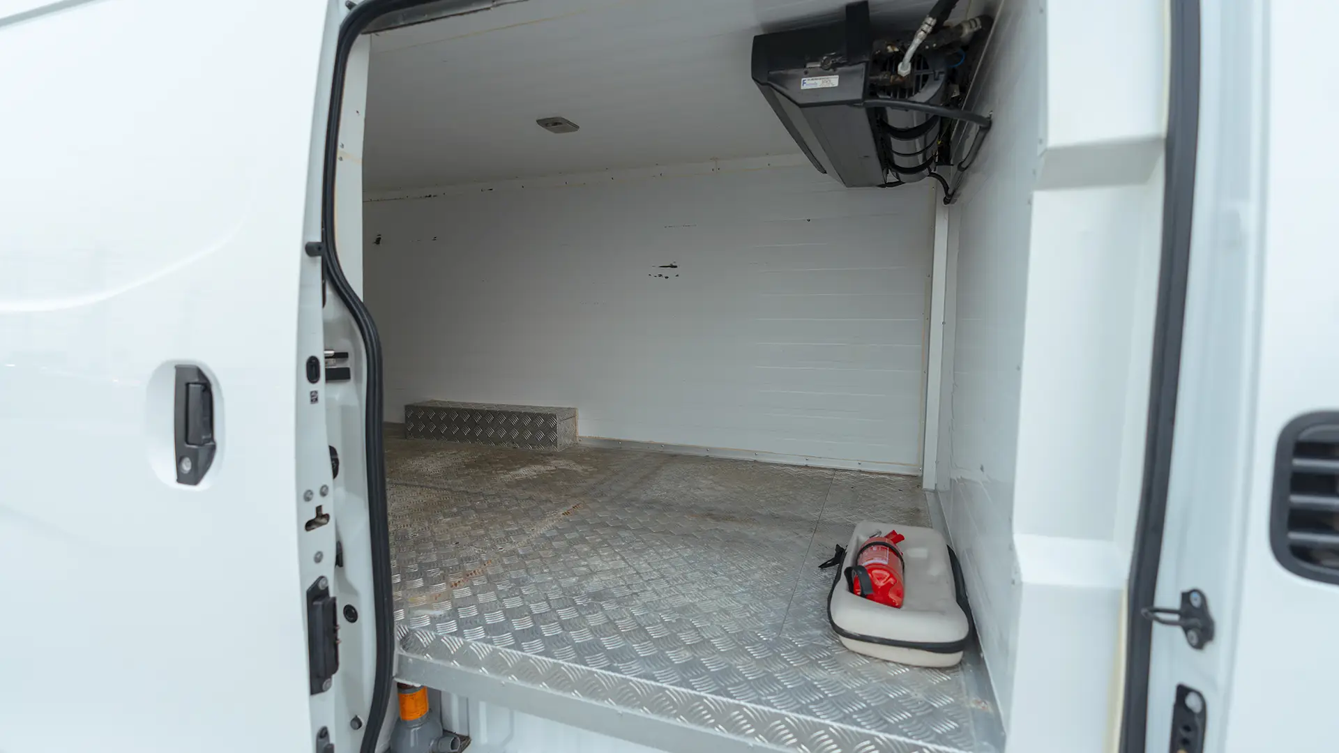 Used 2023 Nissan Urvan Standard Roof in White – Chiller Box Right Side Interior View