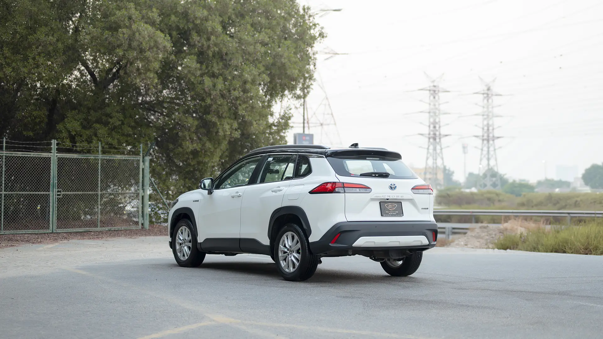 Used 2022 Toyota Corolla Cross GLi in White – Left Back Diagonal (45°) View for Sale at First Choice Cars Dubai Sharjah