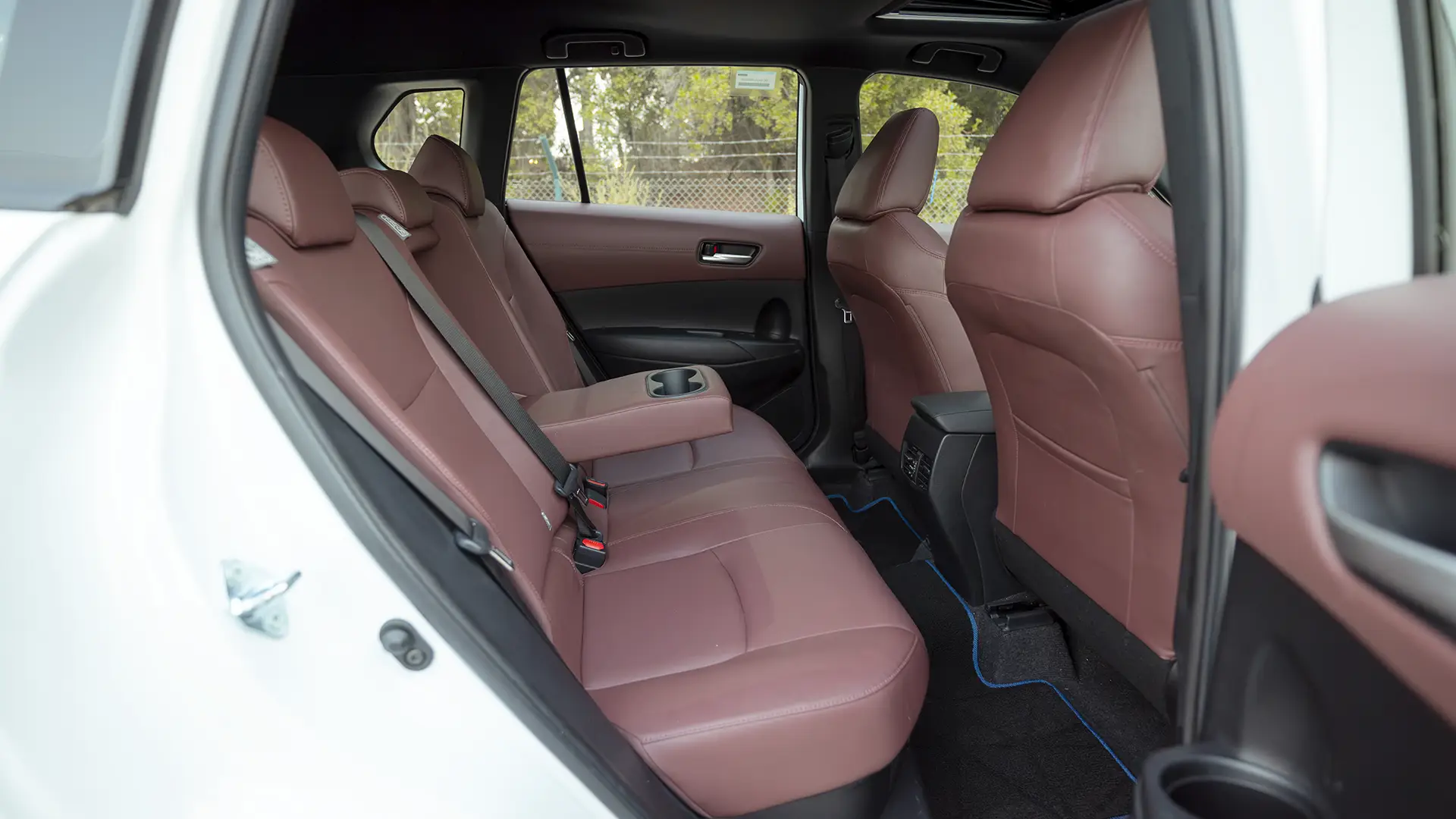Used 2022 Toyota Corolla Cross GLi in White – Rear Passenger Side Cabin View for Sale at First Choice Cars Dubai Sharjah