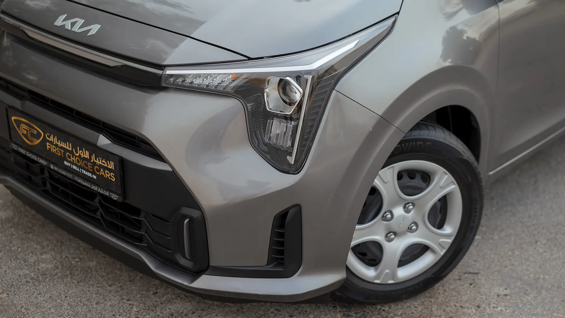 Used 2024 Kia Picanto LX in Grey – Headlight Close-up for Sale at First Choice Cars Dubai Sharjah