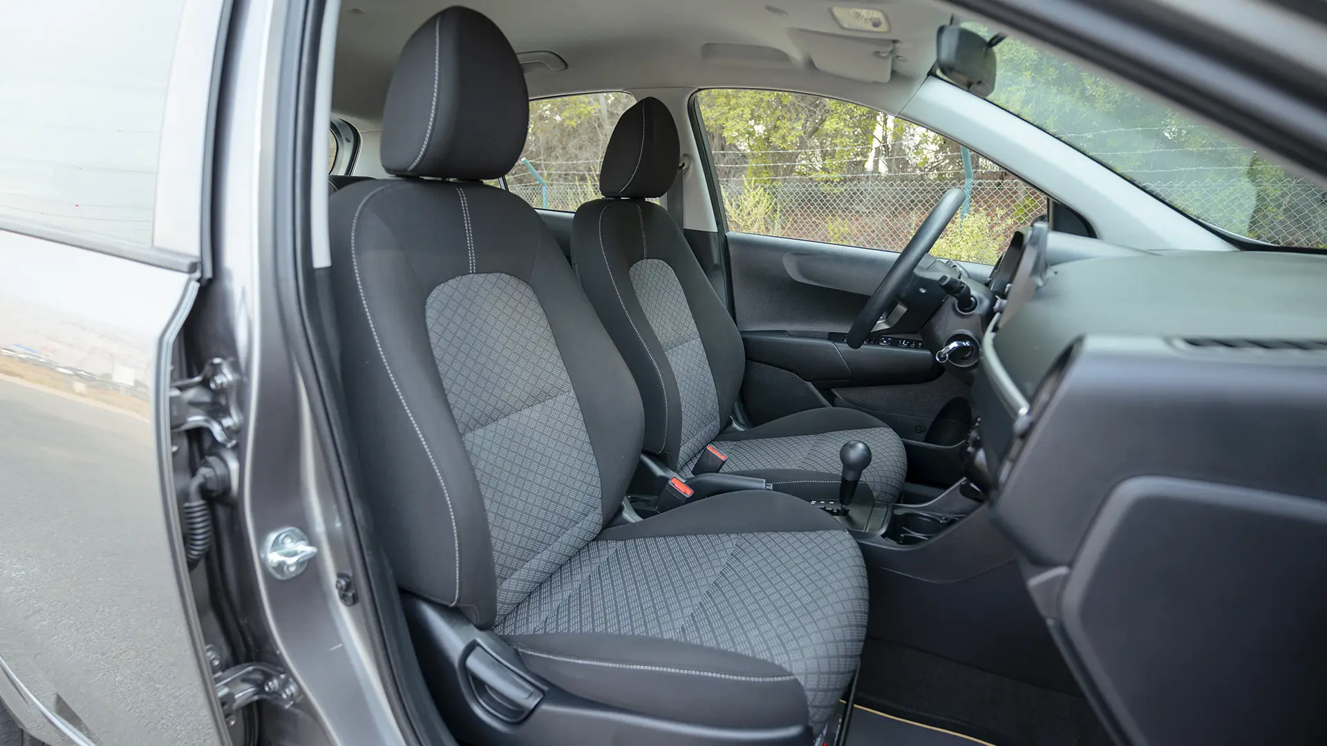 Used 2024 Kia Picanto LX in Grey – Front Passenger Side Cabin View for Sale at First Choice Cars Dubai Sharjah