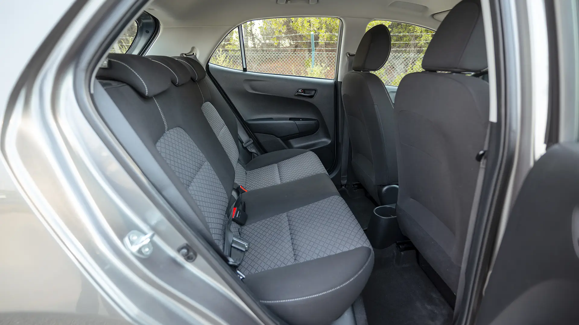 Used 2024 Kia Picanto LX in Grey – Rear Passenger Side Cabin View for Sale at First Choice Cars Dubai Sharjah