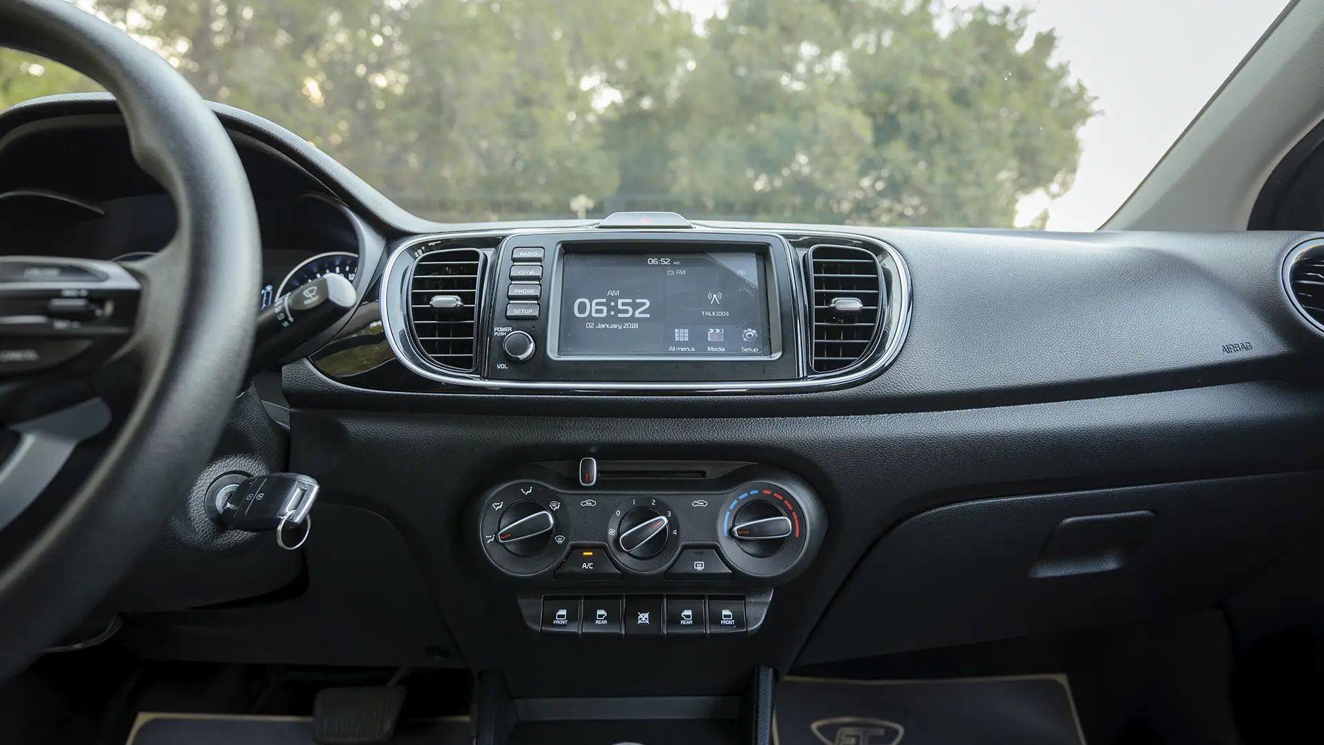 Used 2024 Kia Pegas EX in White – Infotainment / Touchscreen System for Sale at First Choice Cars Dubai Sharjah
