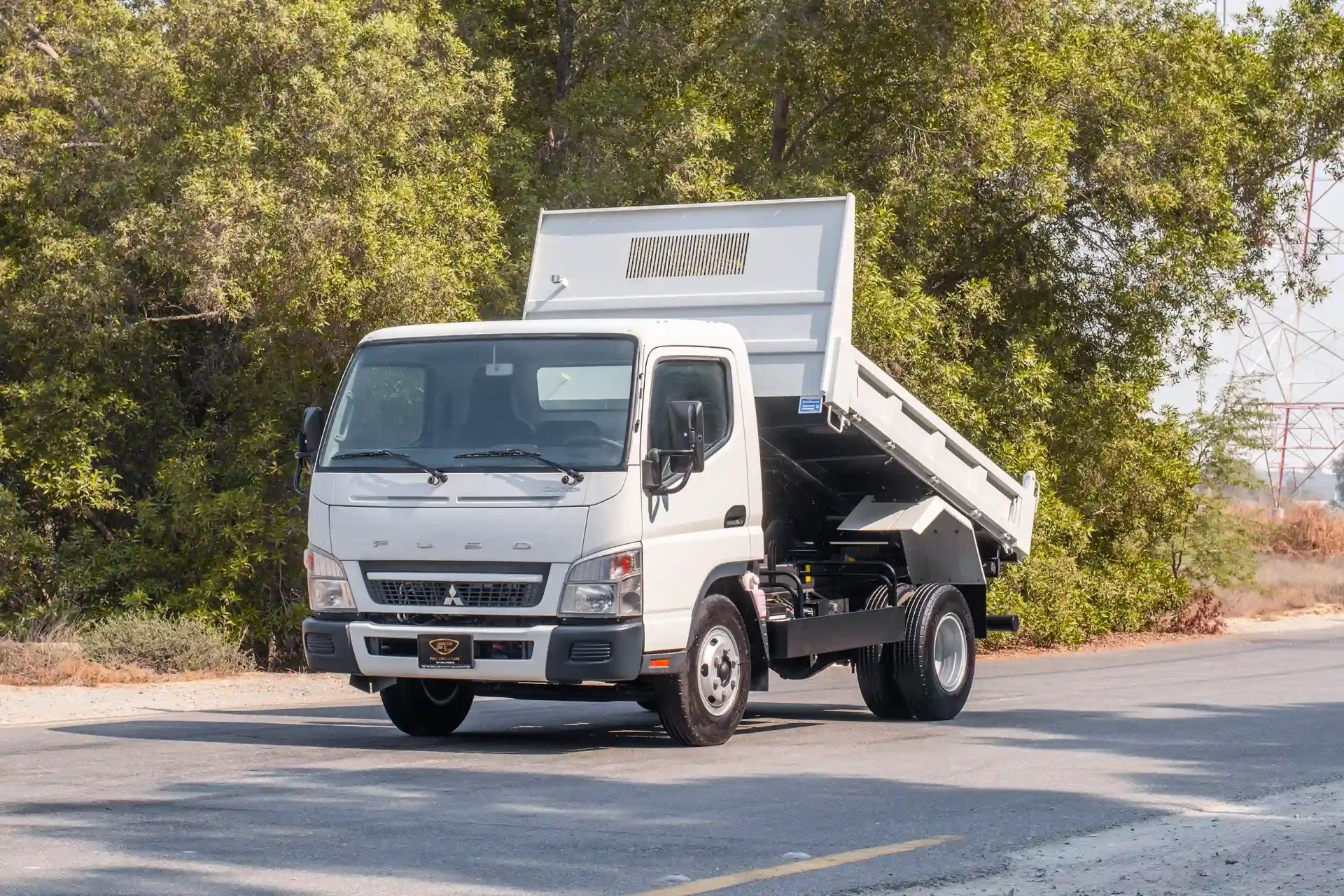 Used 2024 Mitsubishi Canter Tipper in White – Left Front Diagonal (45°) View for Sale at First Choice Cars Dubai Sharjah