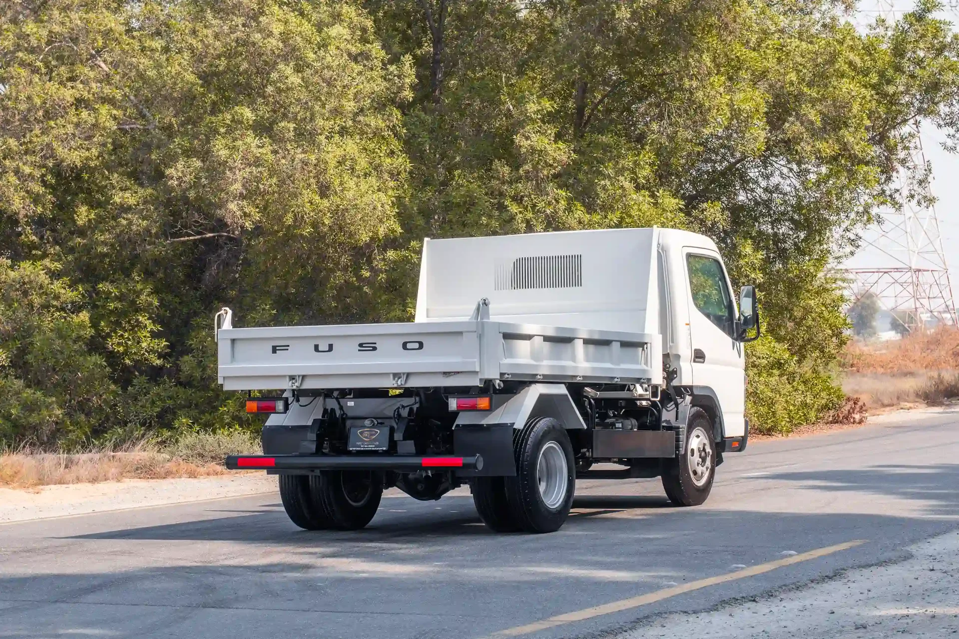 Used 2024 Mitsubishi Canter Tipper in White – Right Back Diagonal (45°) View for Sale at First Choice Cars Dubai Sharjah