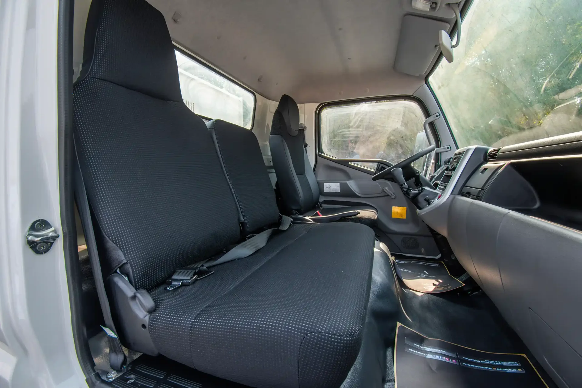 Used 2024 Mitsubishi Canter Tipper in White – Front Passenger Side Cabin View for Sale at First Choice Cars Dubai Sharjah