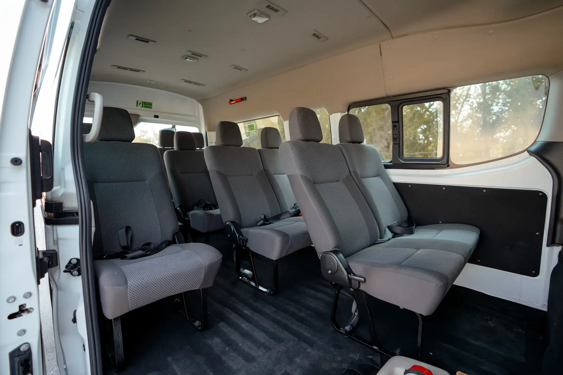 Used 2024 Nissan Urvan High Roof in White – Rear Passenger Side Cabin View