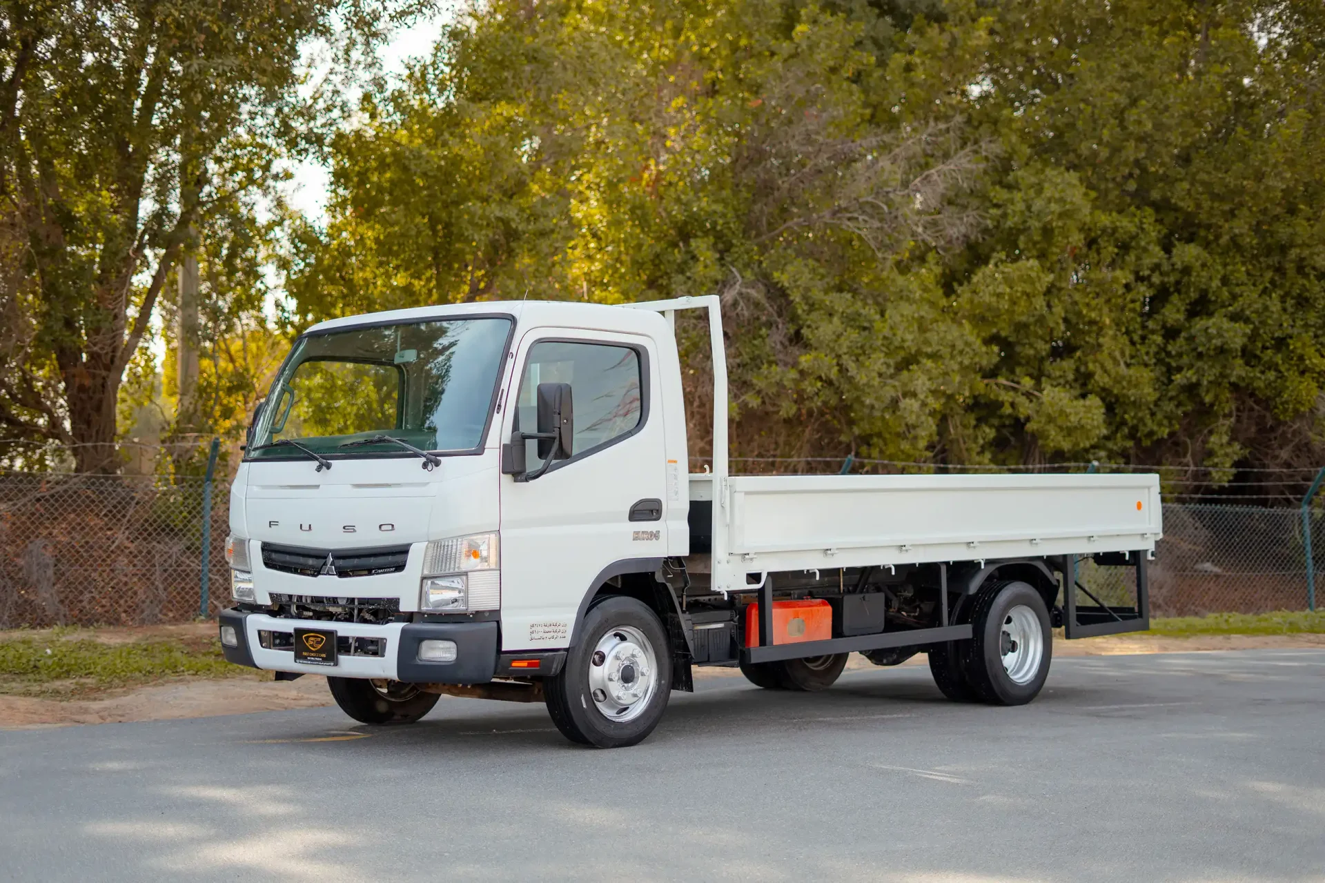 Used 2023 Mitsubishi Canter Cargo Body in White – Left Front Diagonal (45°) View for Sale at First Choice Cars Dubai Sharjah