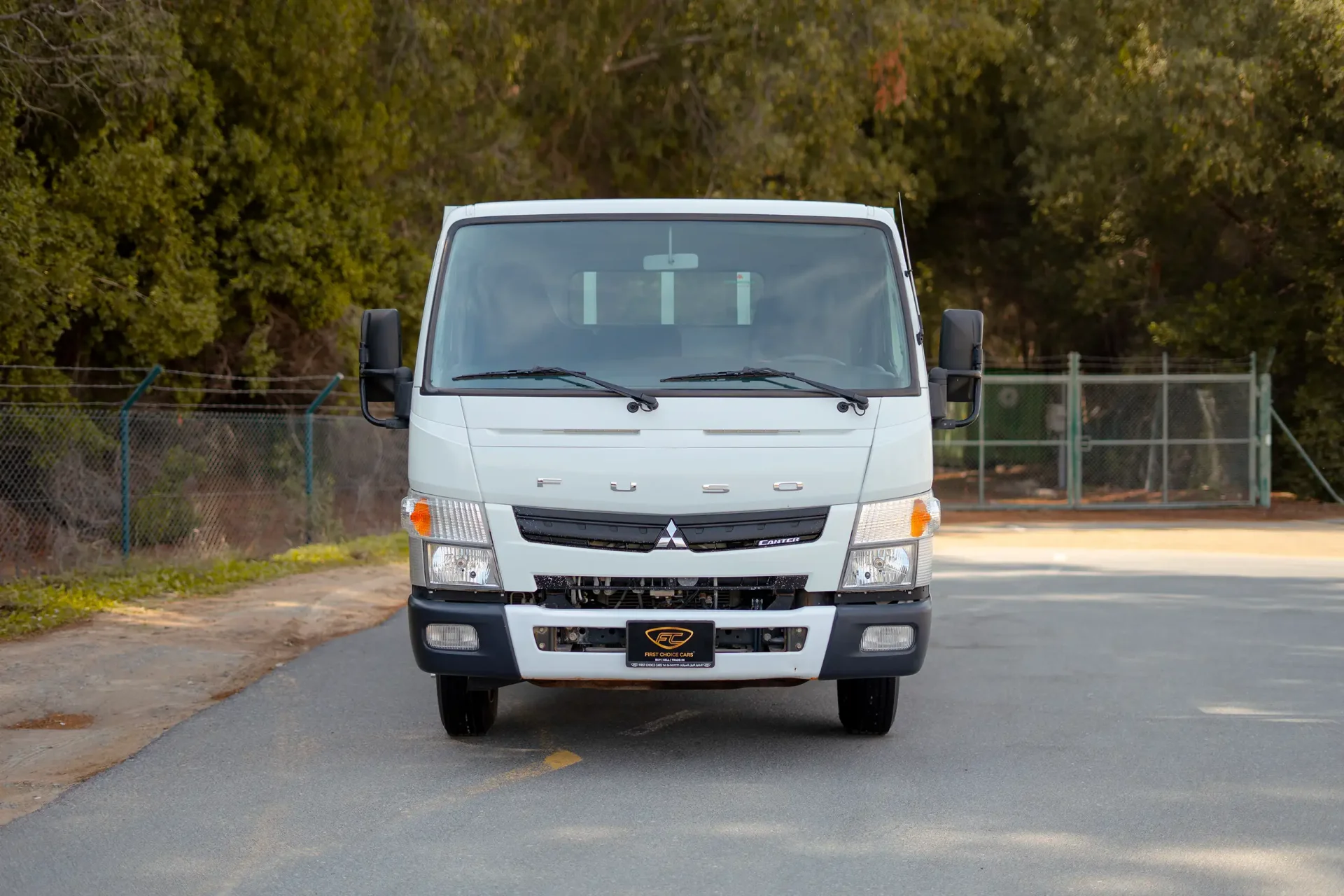 Used 2023 Mitsubishi Canter Cargo Body in White – Front View for Sale at First Choice Cars Dubai Sharjah