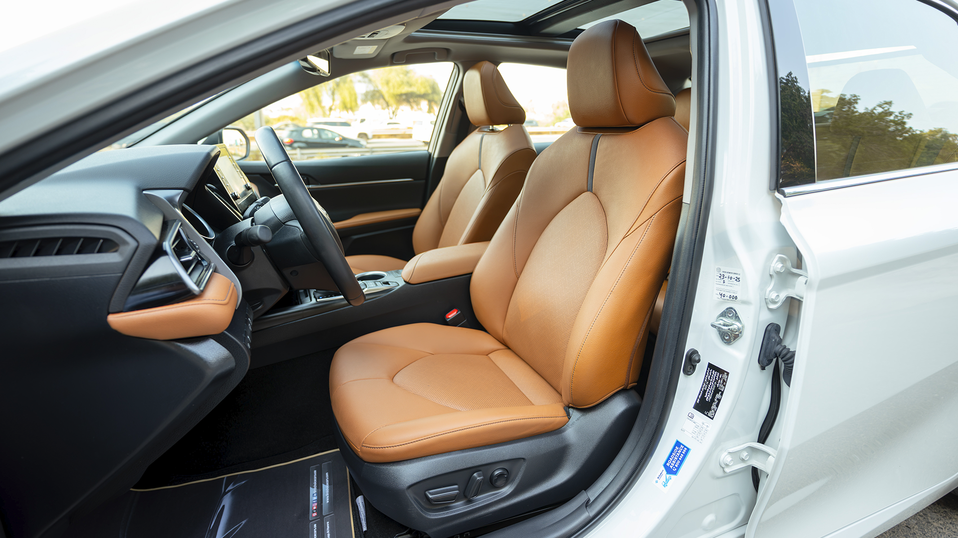 Used 2023 Toyota Camry 40th Anniversary in White – Front Driver Side Cabin View for Sale at First Choice Cars Dubai Sharjah