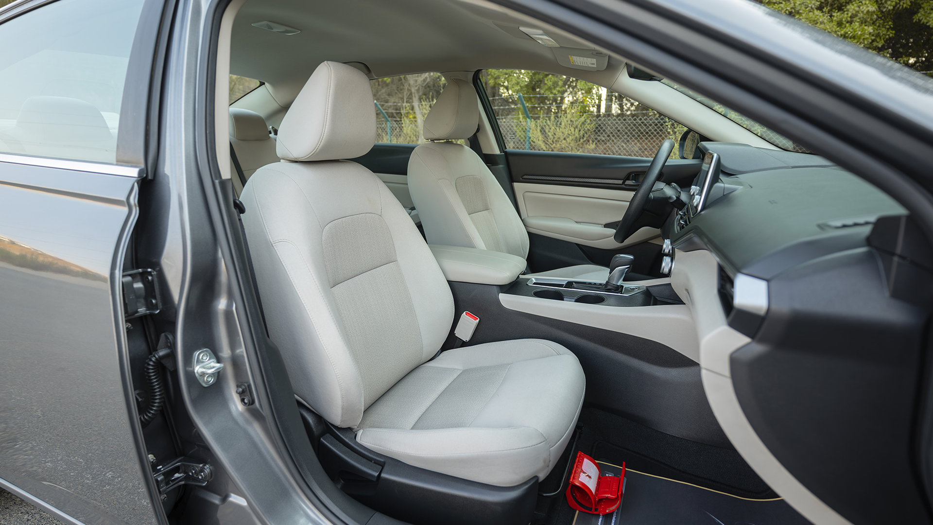 Used 2024 Nissan Altima S in Grey – Front Passenger Side Cabin View for Sale at First Choice Cars Dubai Sharjah