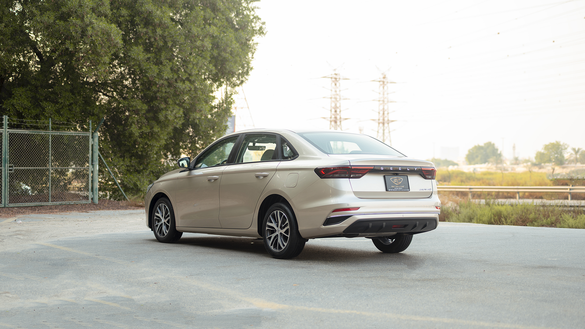 Used 2024 Geely Emgrand GS in Gold – Left Back Diagonal (45°) View for Sale at First Choice Cars Dubai Sharjah