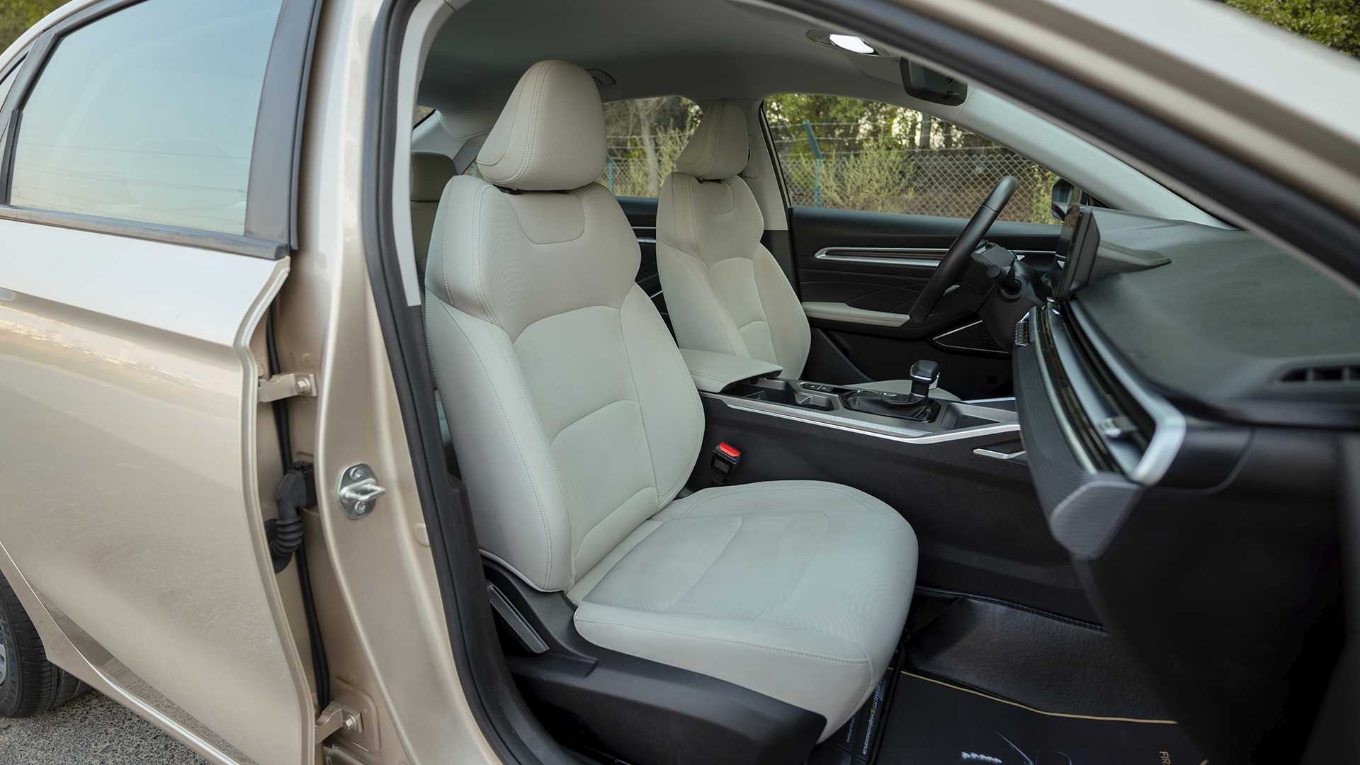 Used 2024 Geely Emgrand GS in Gold – Front Passenger Side Cabin View for Sale at First Choice Cars Dubai Sharjah