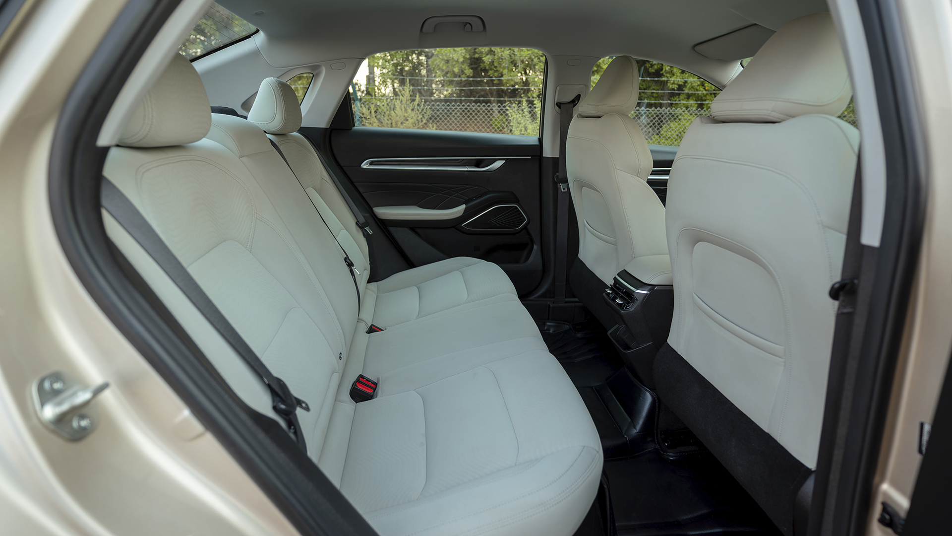 Used 2024 Geely Emgrand GS in Gold – Rear Passenger Side Cabin View for Sale at First Choice Cars Dubai Sharjah
