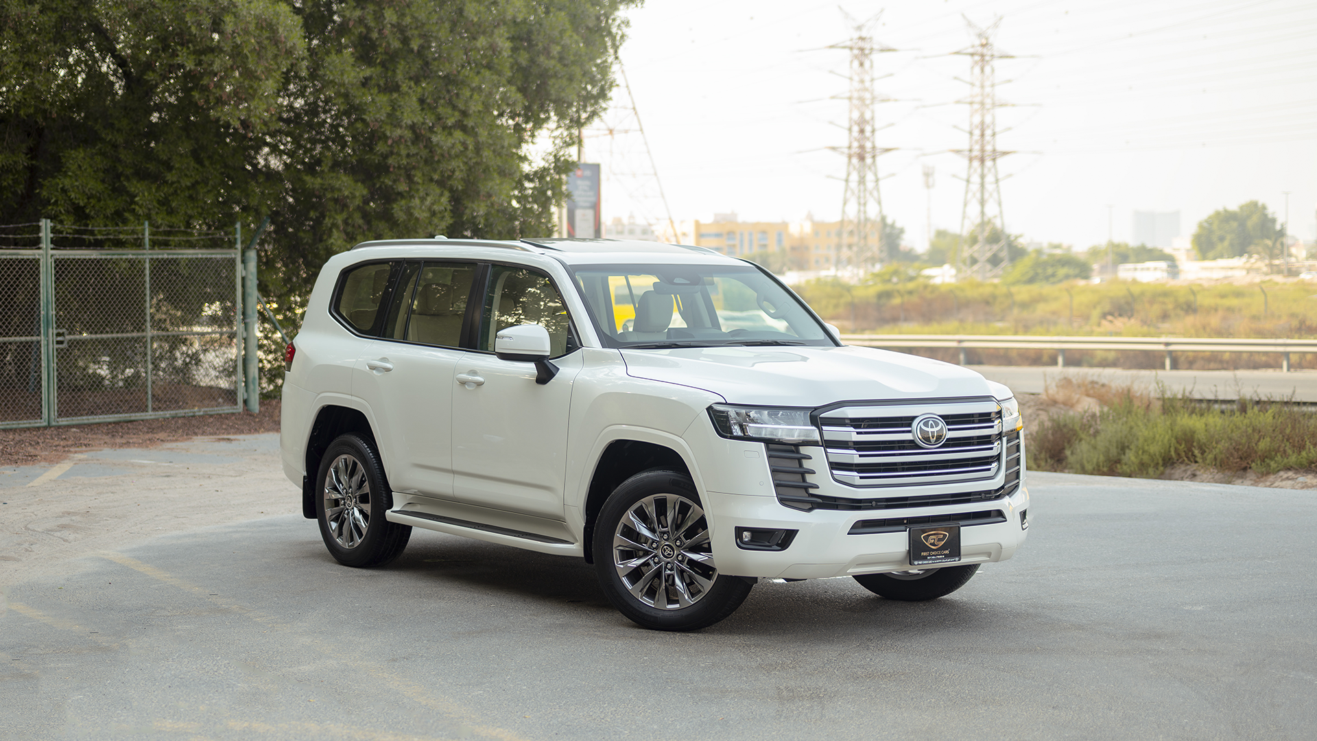 Used 2025 Toyota Land Cruiser GXR in White – Right Front Diagonal (45°) View for Sale at First Choice Cars Dubai Sharjah