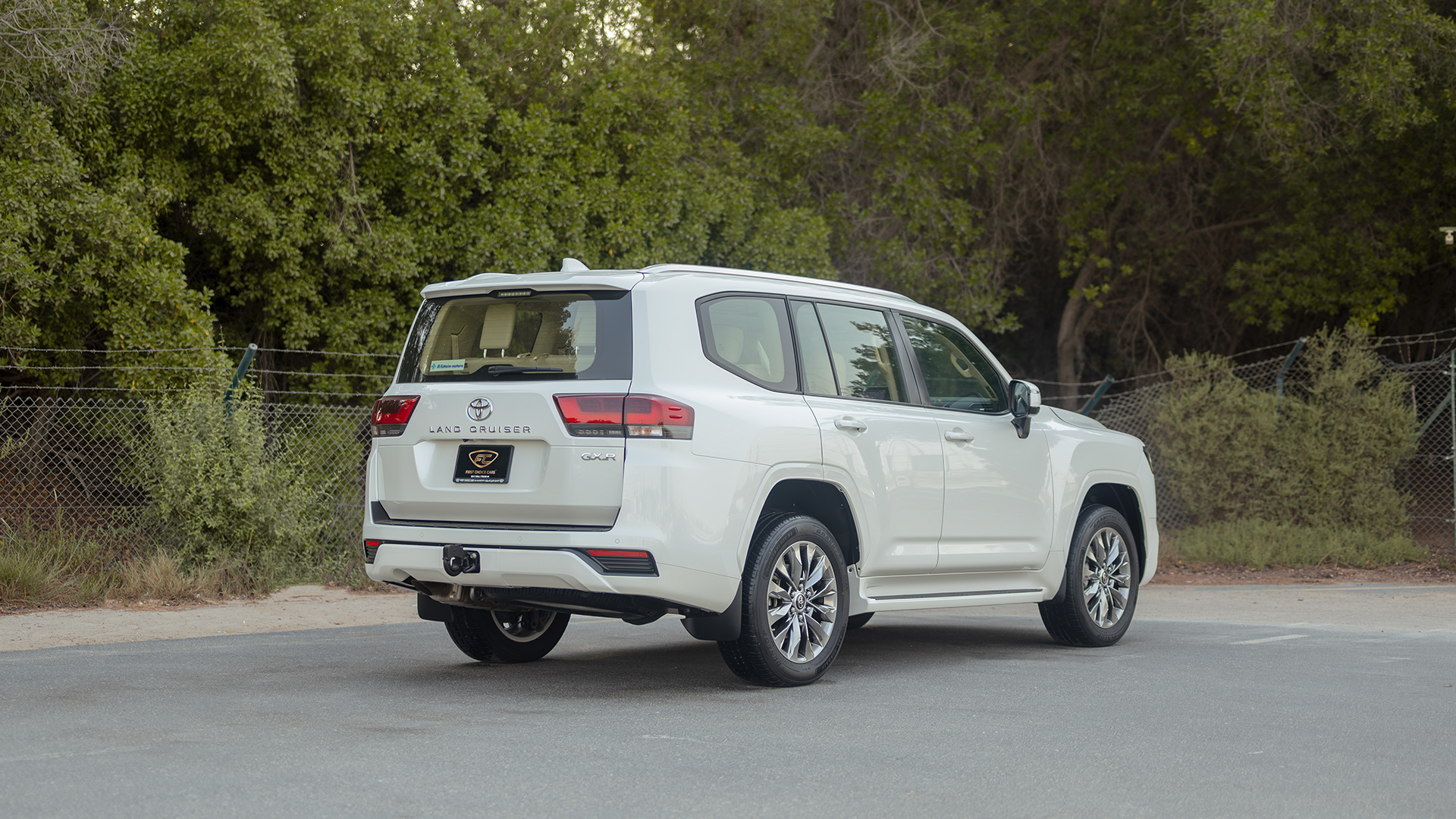 Used 2025 Toyota Land Cruiser GXR in White – Right Back Diagonal (45°) View for Sale at First Choice Cars Dubai Sharjah
