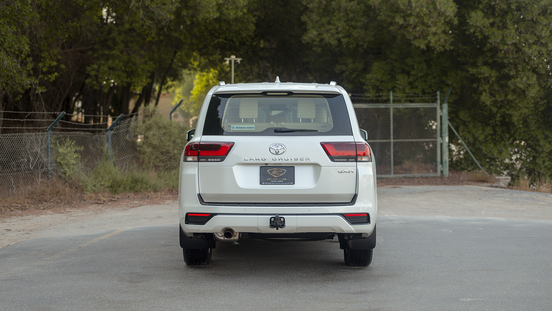 Used 2025 Toyota Land Cruiser GXR in White – Back/Rear View for Sale at First Choice Cars Dubai Sharjah
