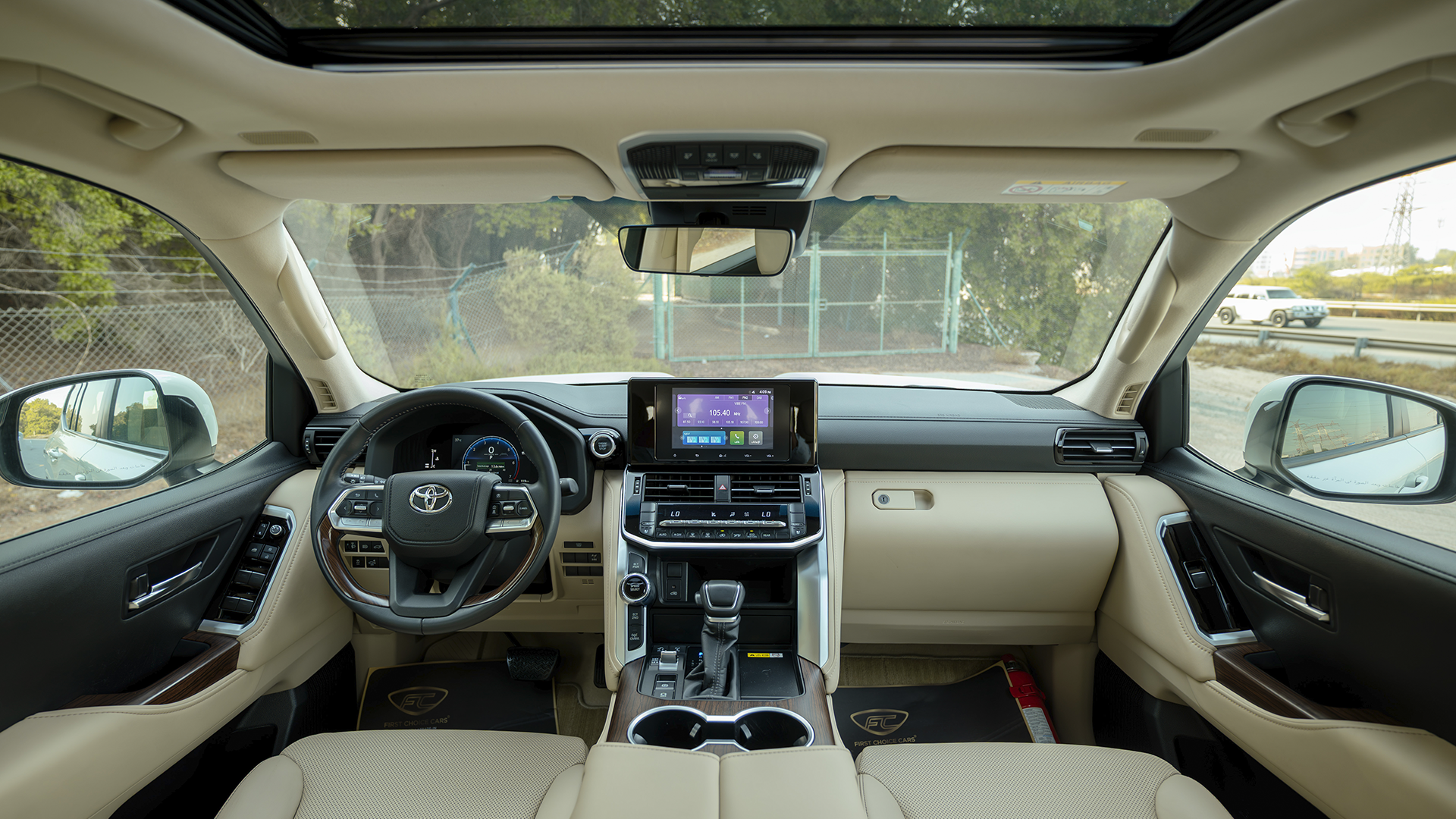 Used 2025 Toyota Land Cruiser GXR in White – Front Cabin / Dashboard Full View for Sale at First Choice Cars Dubai Sharjah
