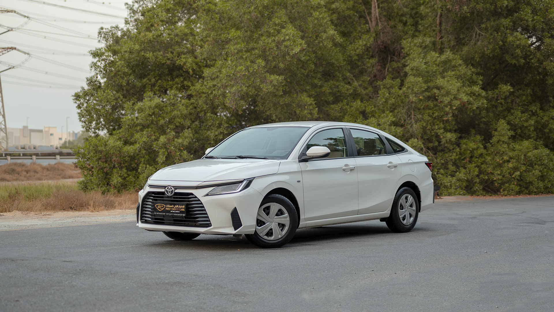 Used 2024 Toyota Yaris E in White – Left Front Diagonal (45°) View for Sale at First Choice Cars Dubai Sharjah