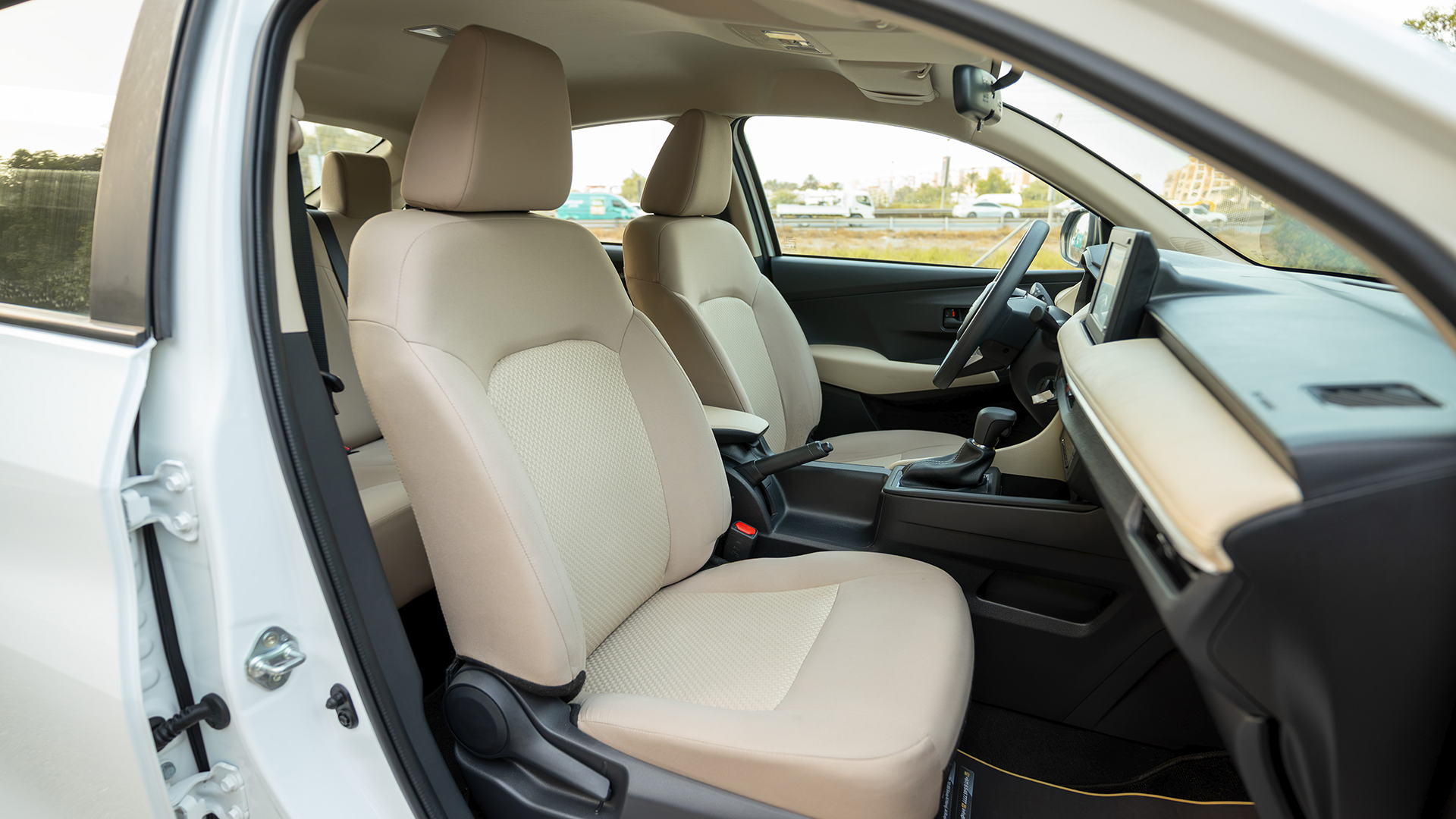 Used 2024 Toyota Yaris E in White – Front Passenger Side Cabin View for Sale at First Choice Cars Dubai Sharjah