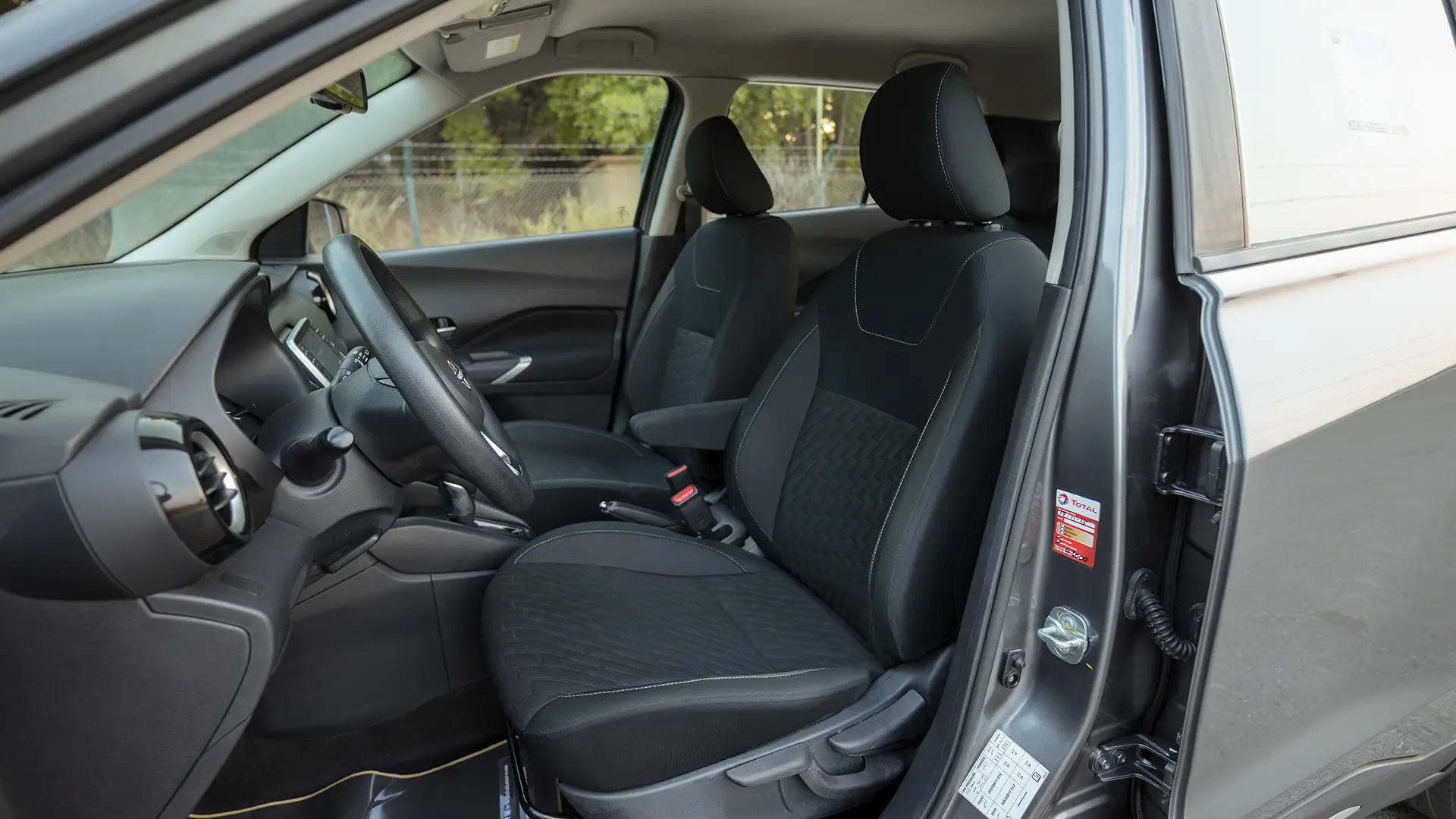 Used 2024 Nissan Kicks SV in Grey – Front Driver Side Cabin View