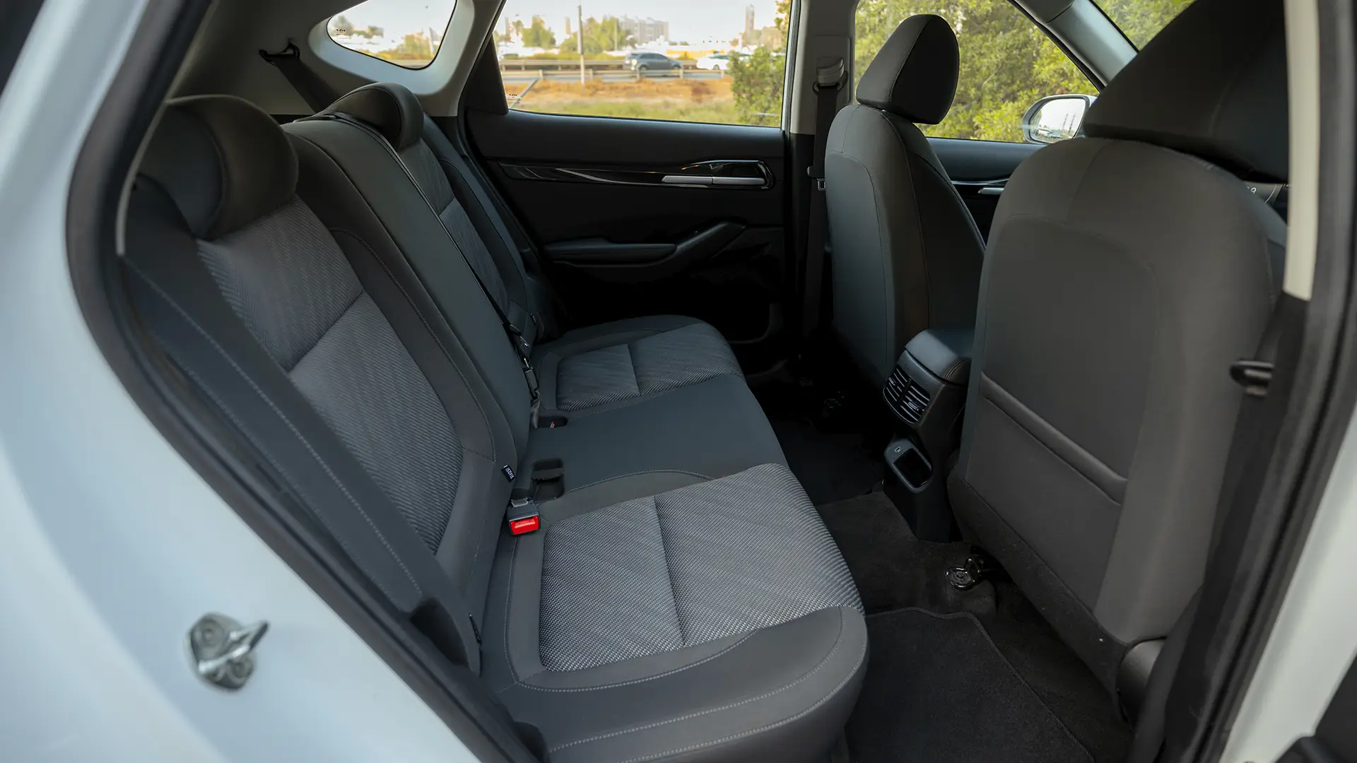 Used 2024 Kia Seltos LX in White – Rear Passenger Side Cabin View