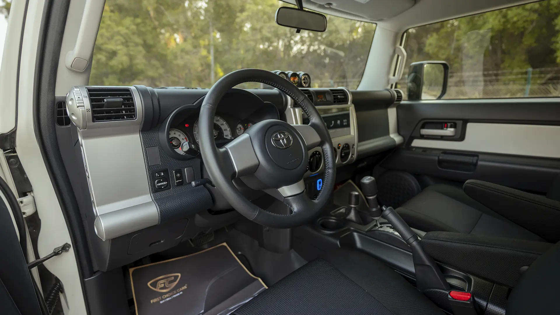Used 2023 Toyota FJ Cruiser Gxr in White – Driver Side Dashboard & Steering View