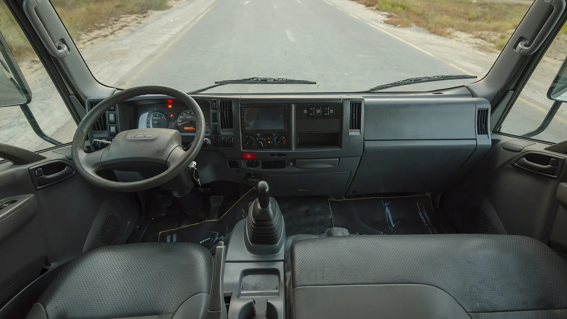 Used 2022 Isuzu N-Series NPR in White – Front Cabin / Dashboard Full View