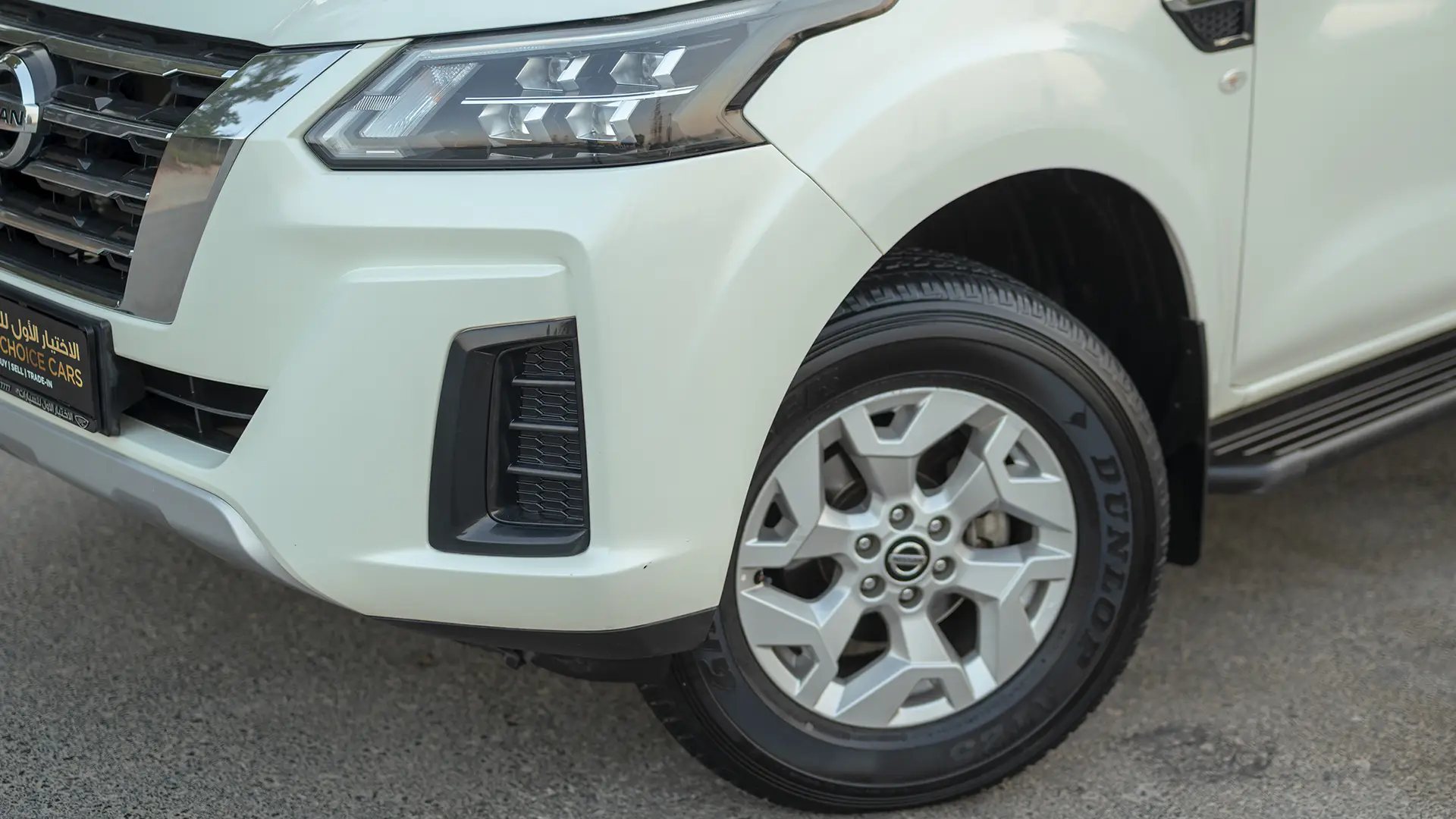 Used 2023 Nissan Xterra SE in White – Headlight Close-up