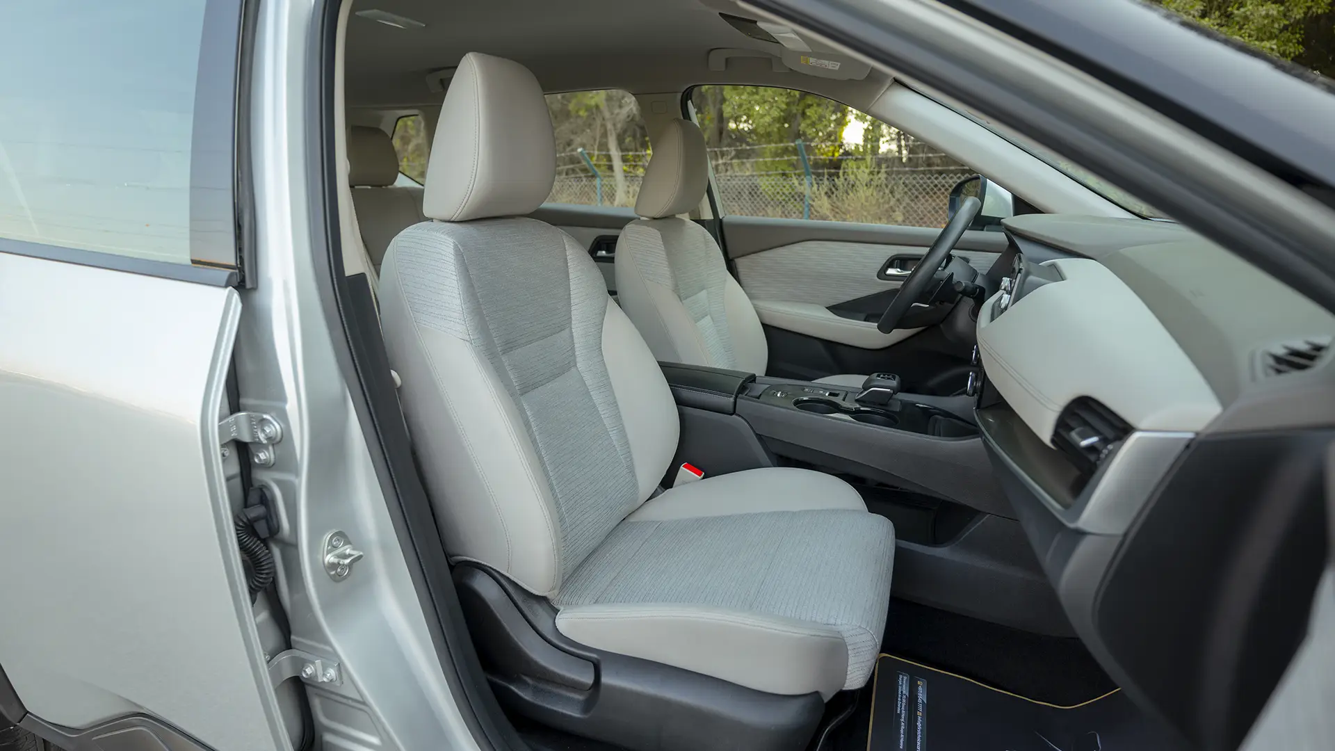 Used 2024 Nissan X-Trail S in Silver – Front Passenger Side Cabin View