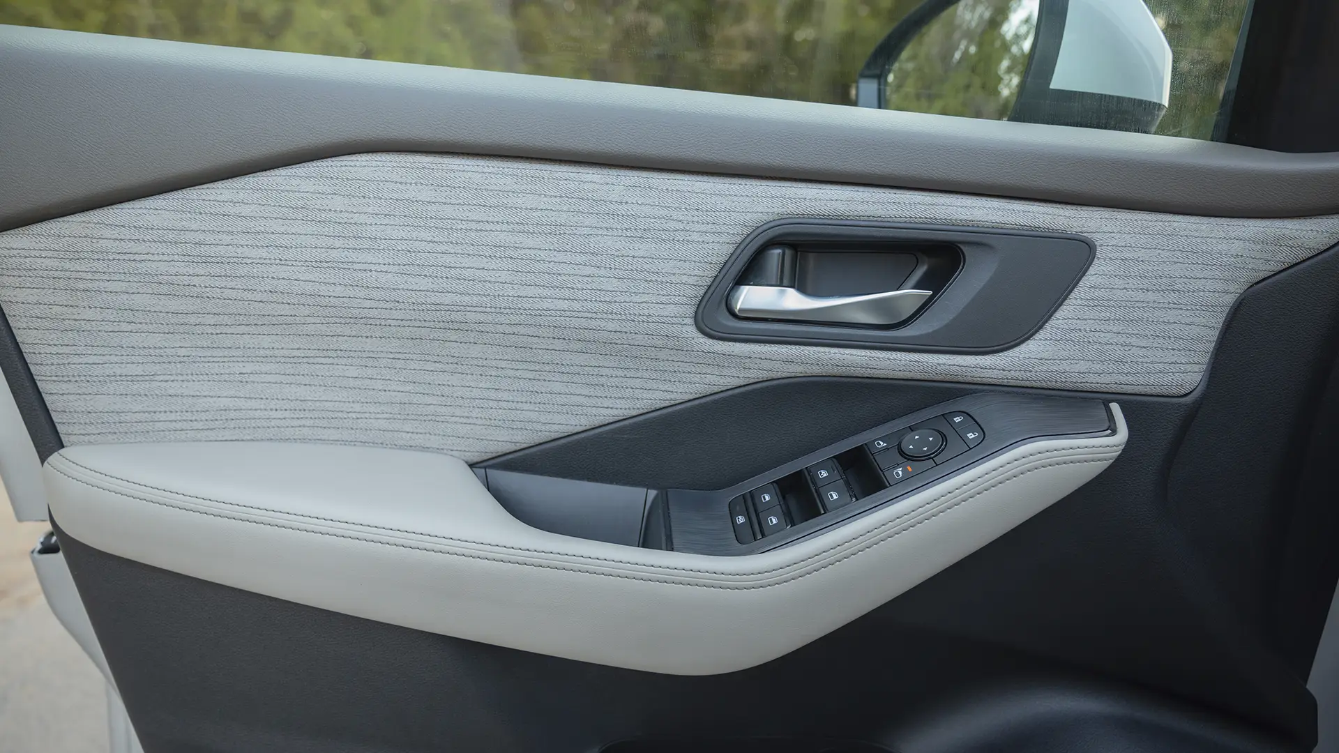 Used 2024 Nissan X-Trail S in Silver – Driver Door Panel Full View