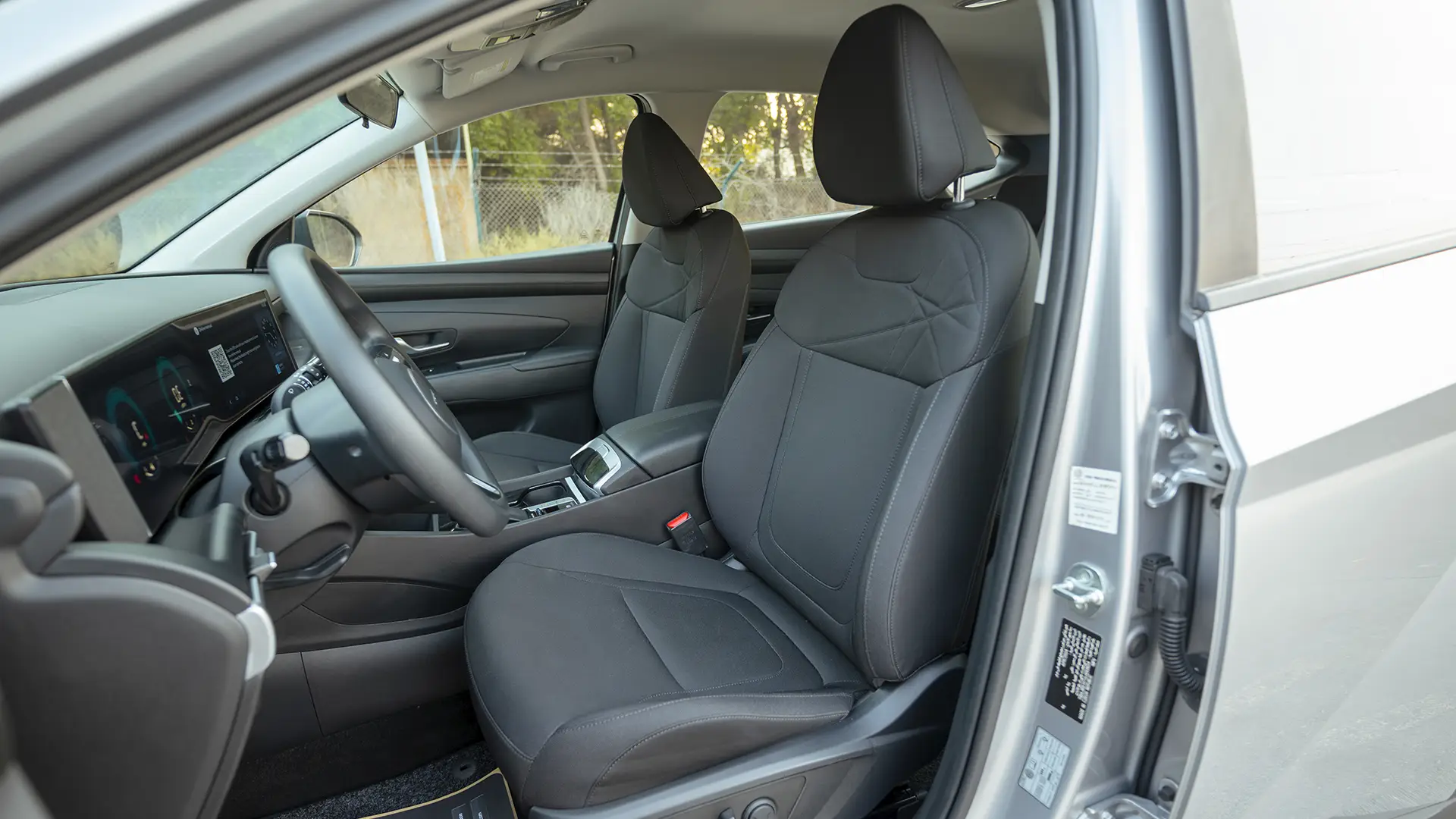 Used 2025 Hyundai Tucson Smart in Silver – Front Driver Side Cabin View