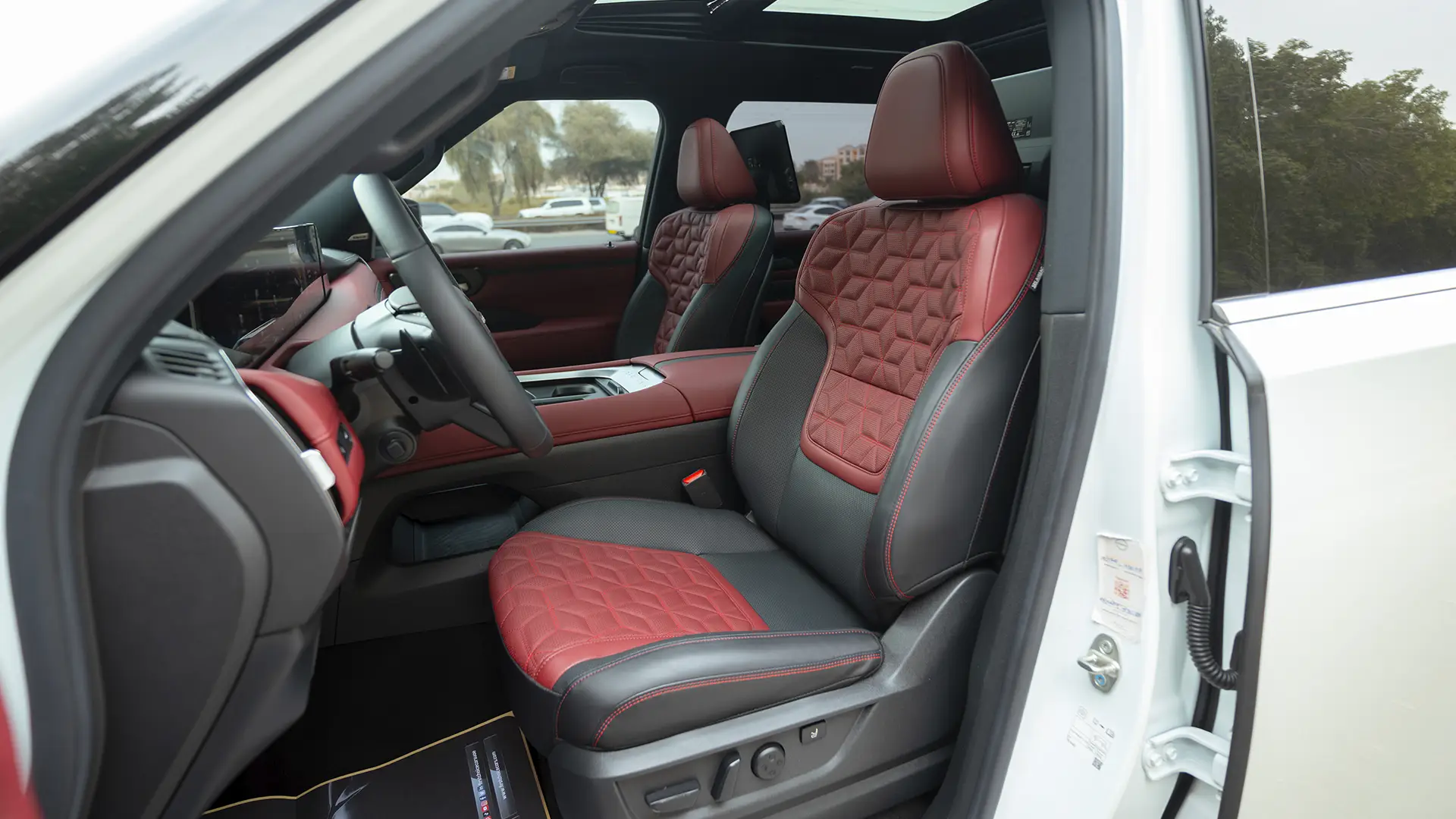 Used 2026 Nissan Patrol LE Platinum City in White – Front Driver Side Cabin View