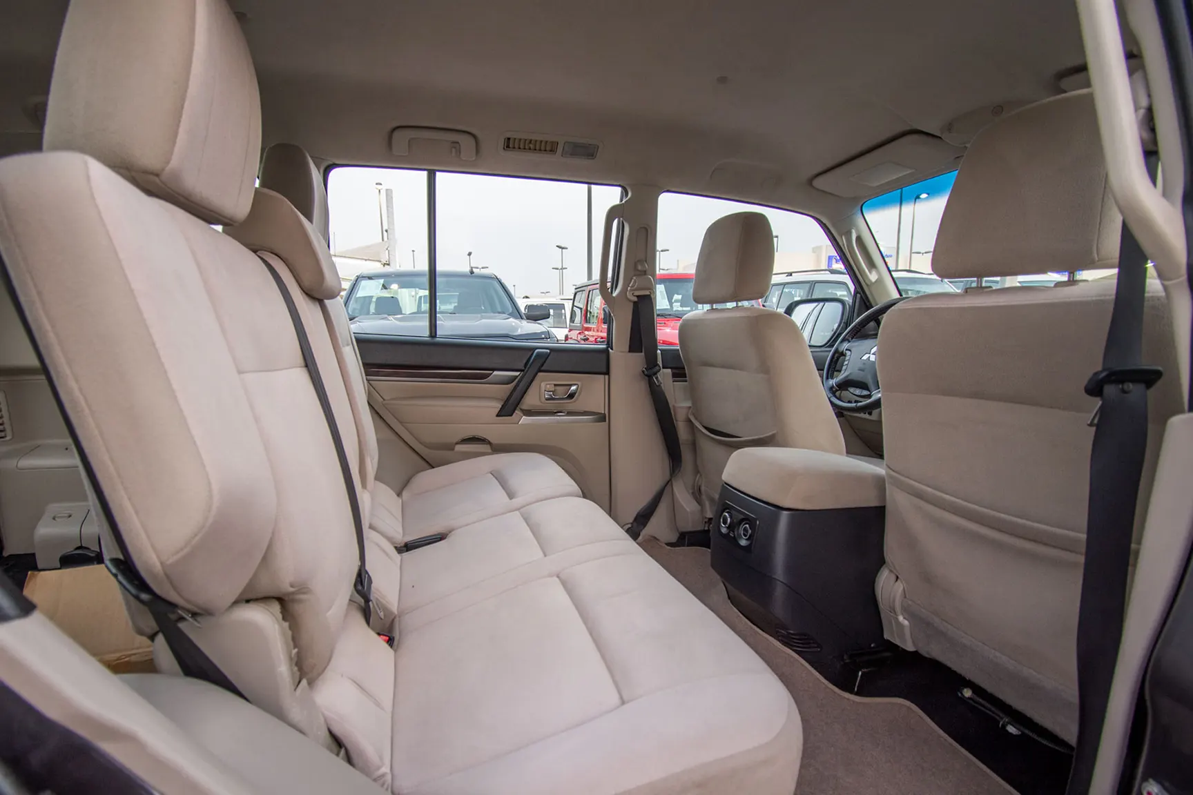 Used 2017 Mitsubishi PAJERO 3.5L GLS Silver – Rear Driver Side Cabin View at First Choice Cars Sharjah